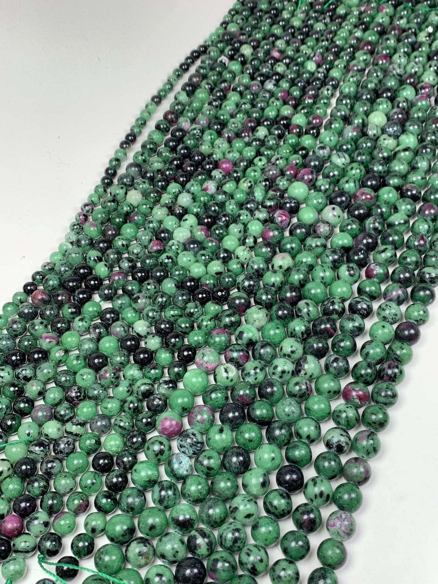 Natural Ruby Zoisite Beads: Smooth Round Gemstone Strand (15.5")