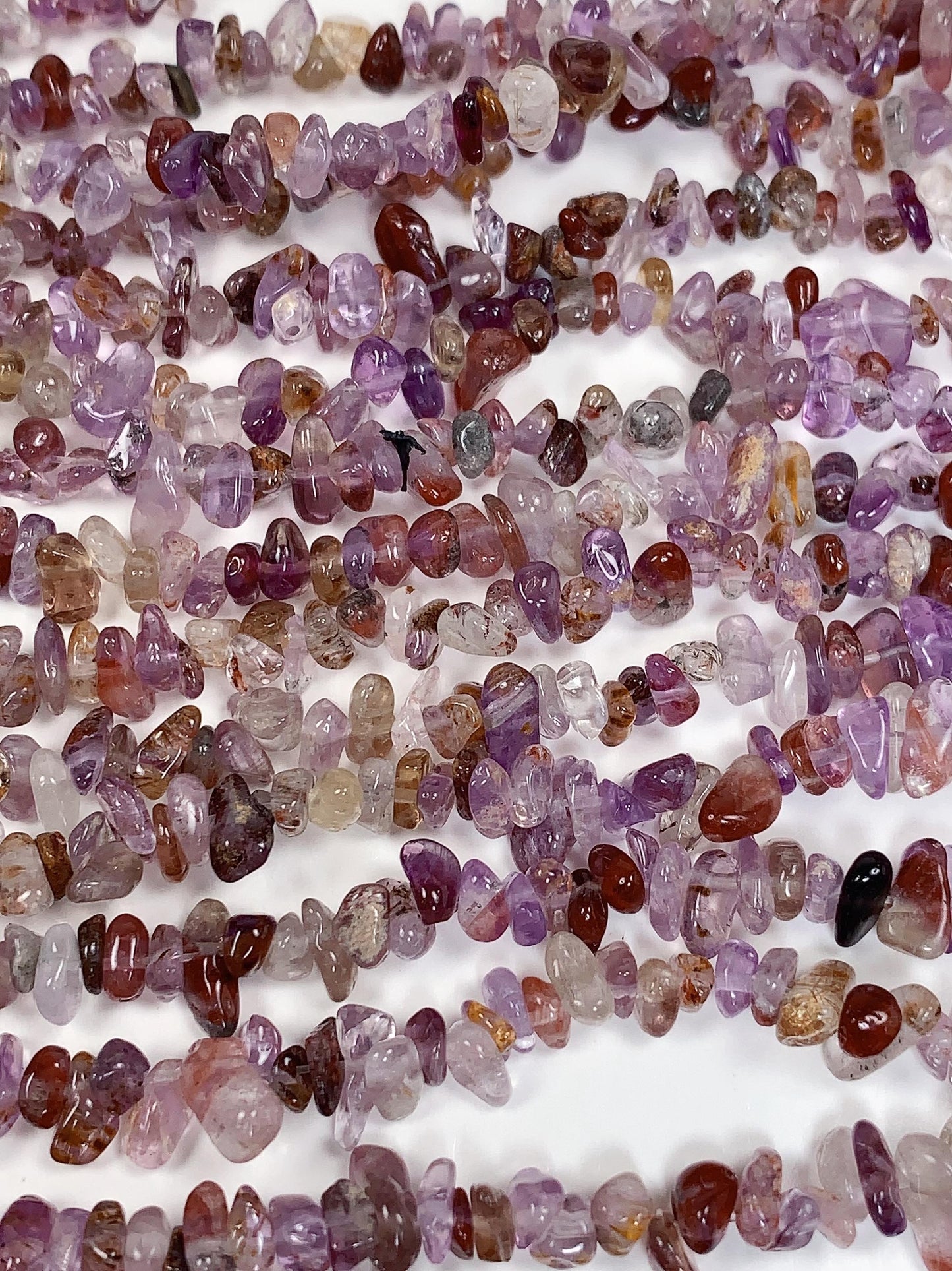 Super 7 Crystal Chip Beads: Natural Amethyst Cacoxenite Quartz (32" Strand)