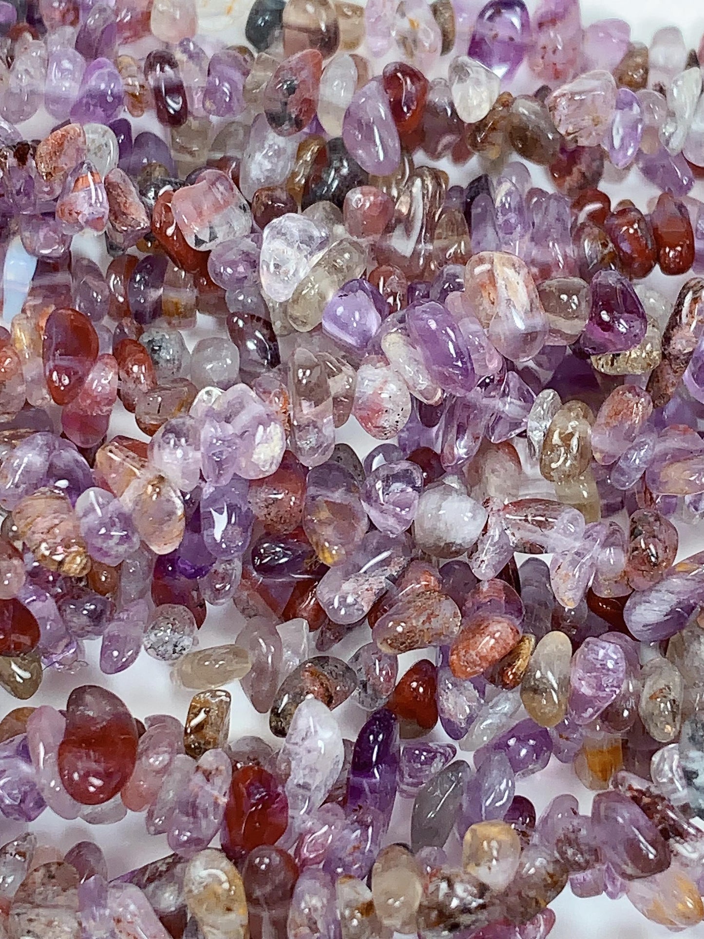 Super 7 Crystal Chip Beads: Natural Amethyst Cacoxenite Quartz (32" Strand)