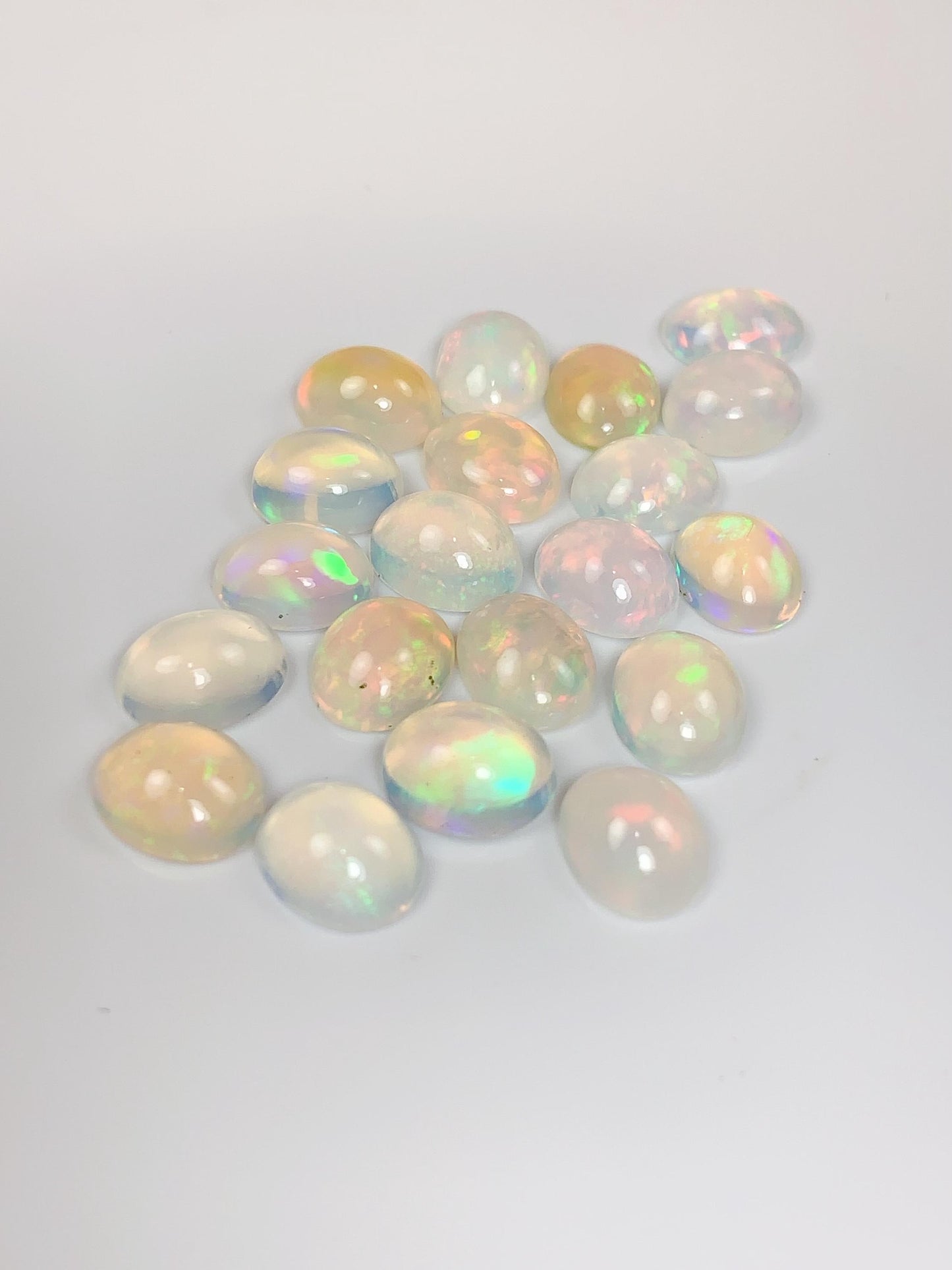 Natural Rainbow Opal Gemstone: 10mm x 8mm Oval Cut Loose Gem