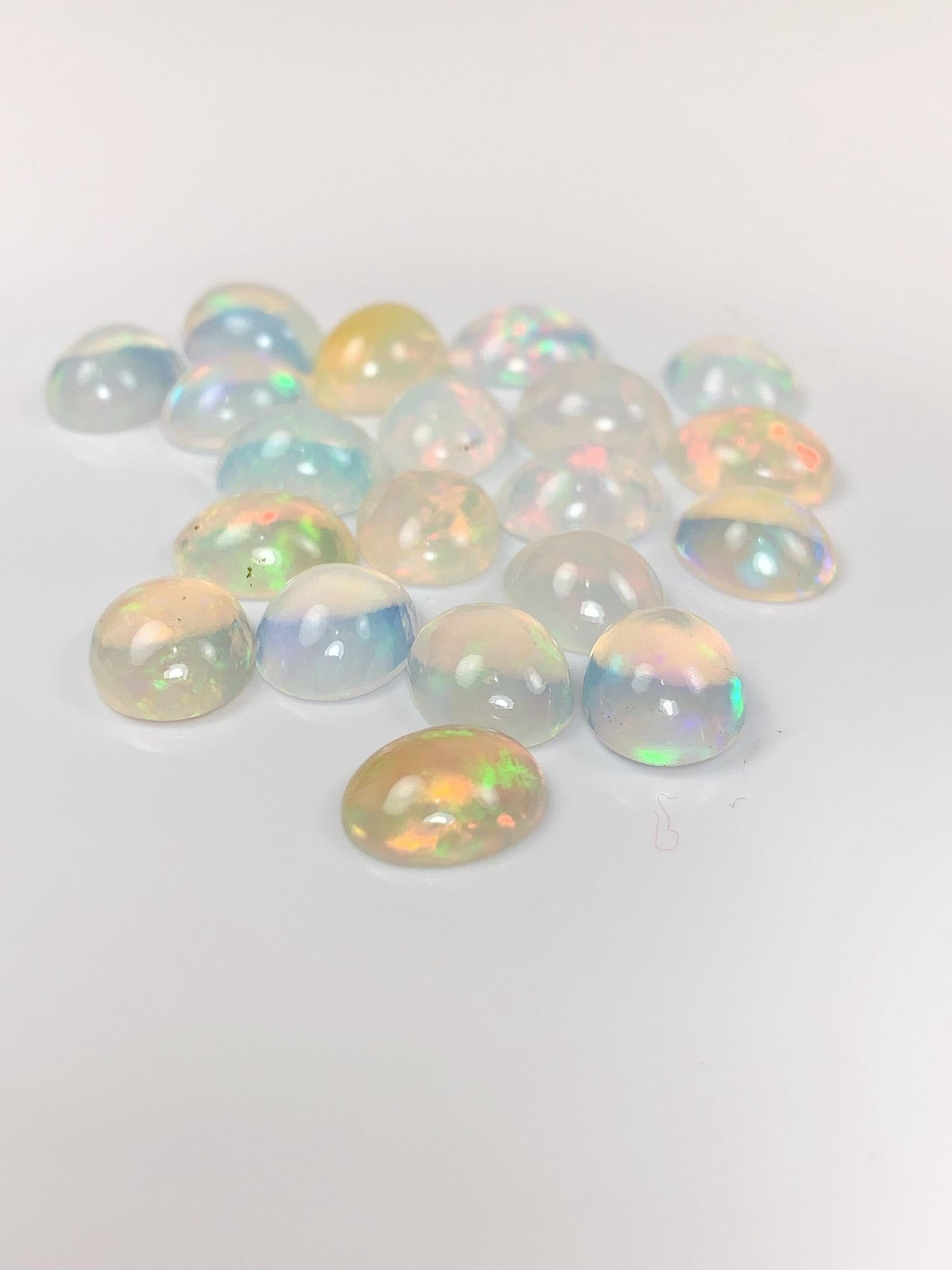 Natural Rainbow Opal Gemstone: 10mm x 8mm Oval Cut Loose Gem