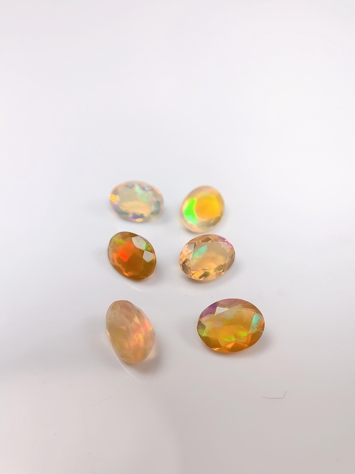 6x8mm Natural Rainbow Opal Gemstone: Faceted Oval Cut
