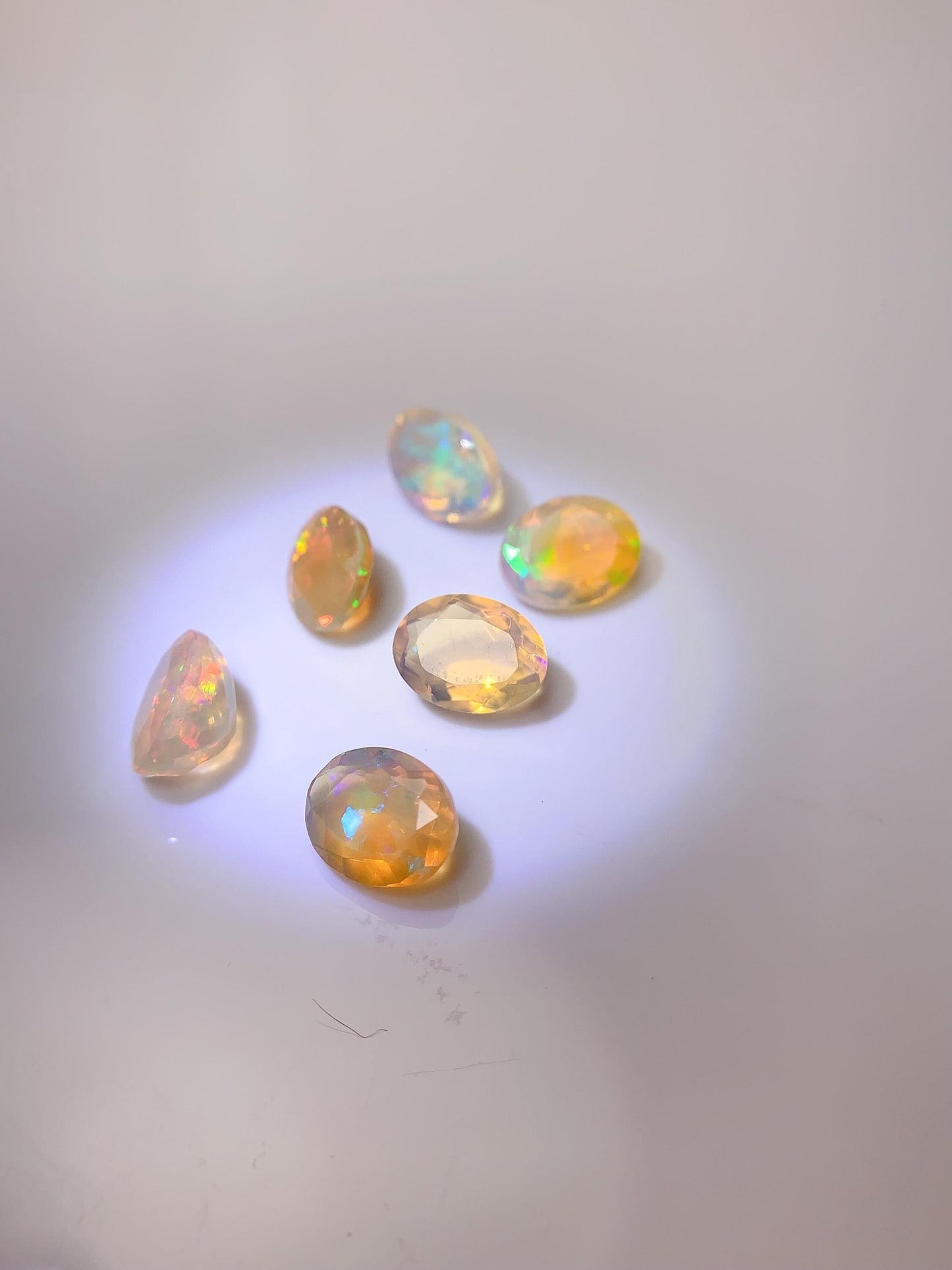 6x8mm Natural Rainbow Opal Gemstone: Faceted Oval Cut