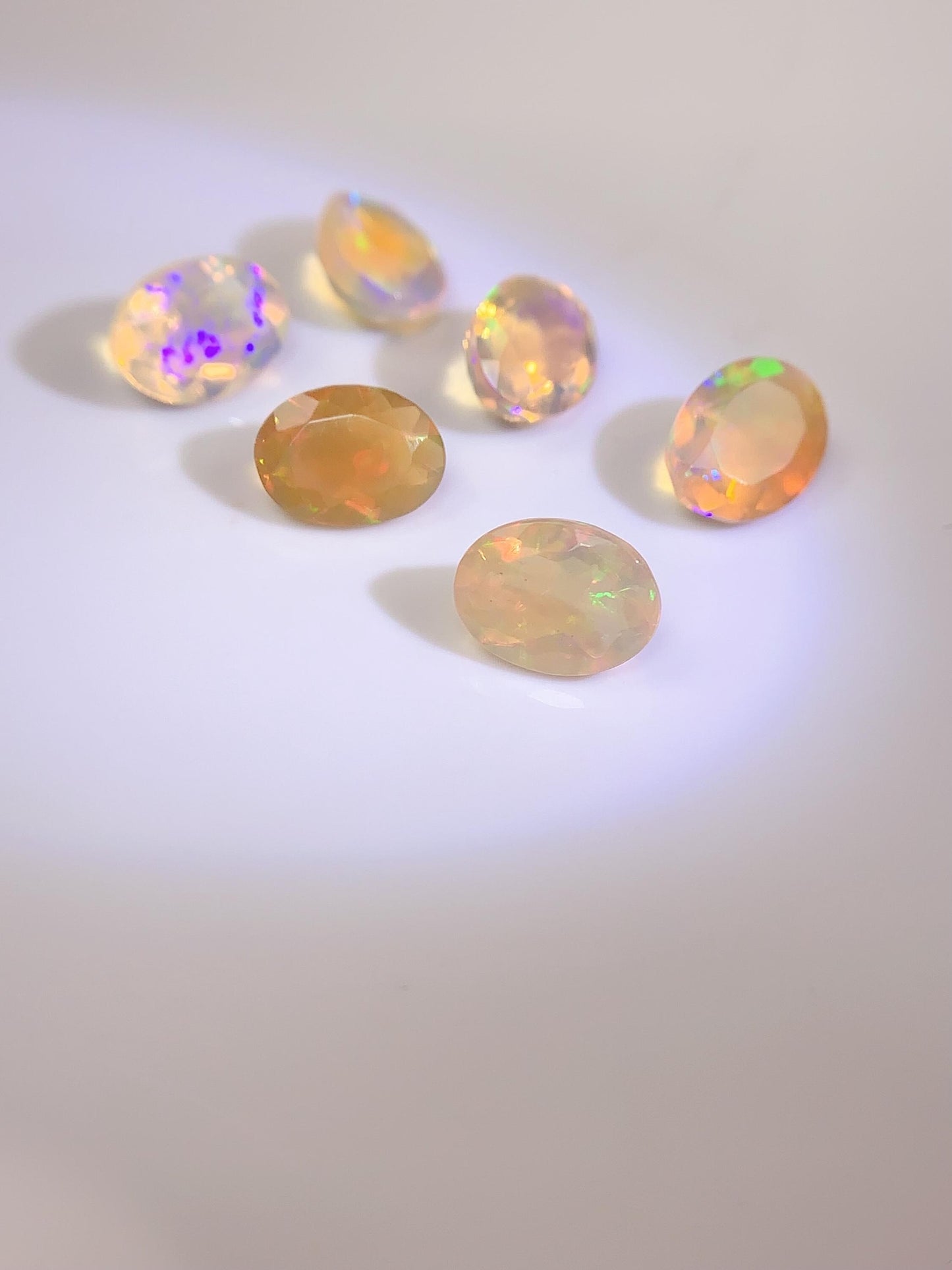 6x8mm Natural Rainbow Opal Gemstone: Faceted Oval Cut