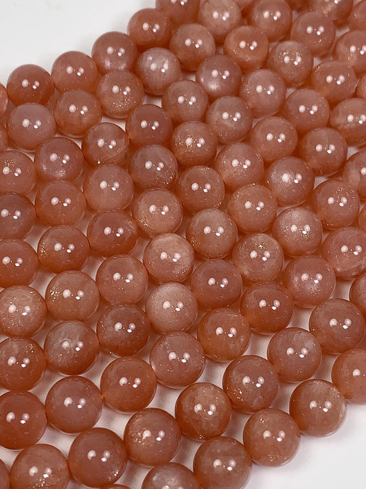 AAA Golden Peach Sunstone Beads: 15.5" Smooth Round Strand