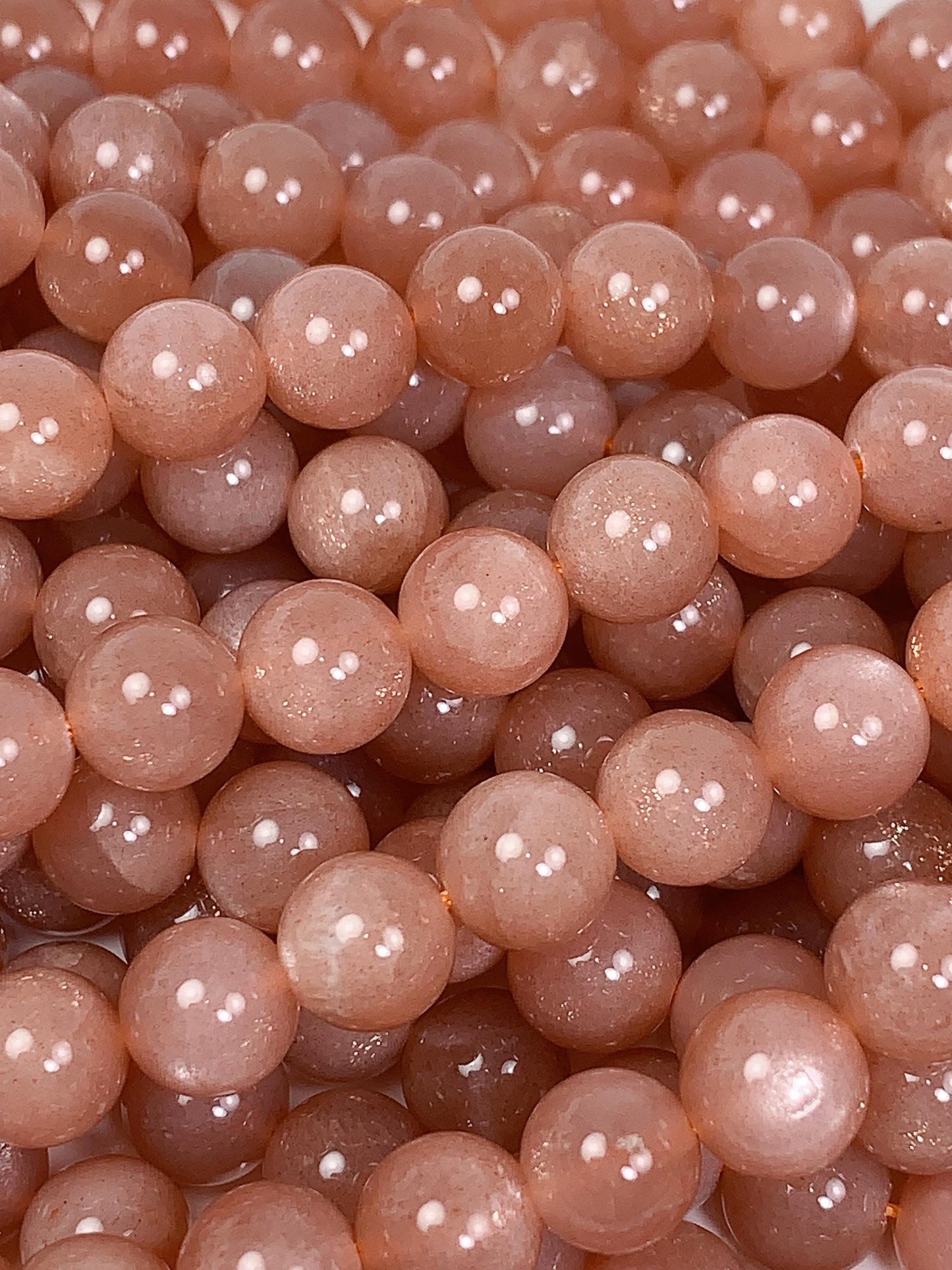 AAA Golden Peach Sunstone Beads: 15.5" Smooth Round Strand