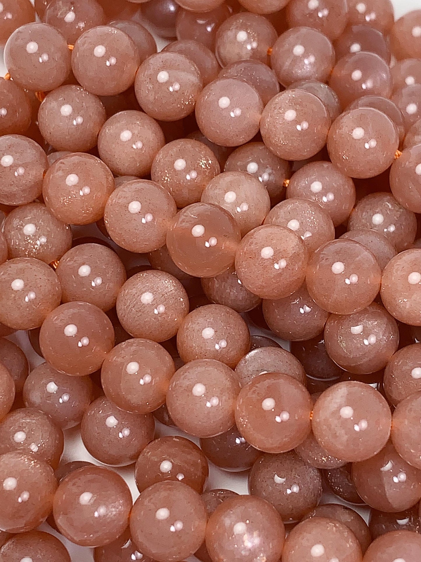 AAA Golden Peach Sunstone Beads: 15.5" Smooth Round Strand