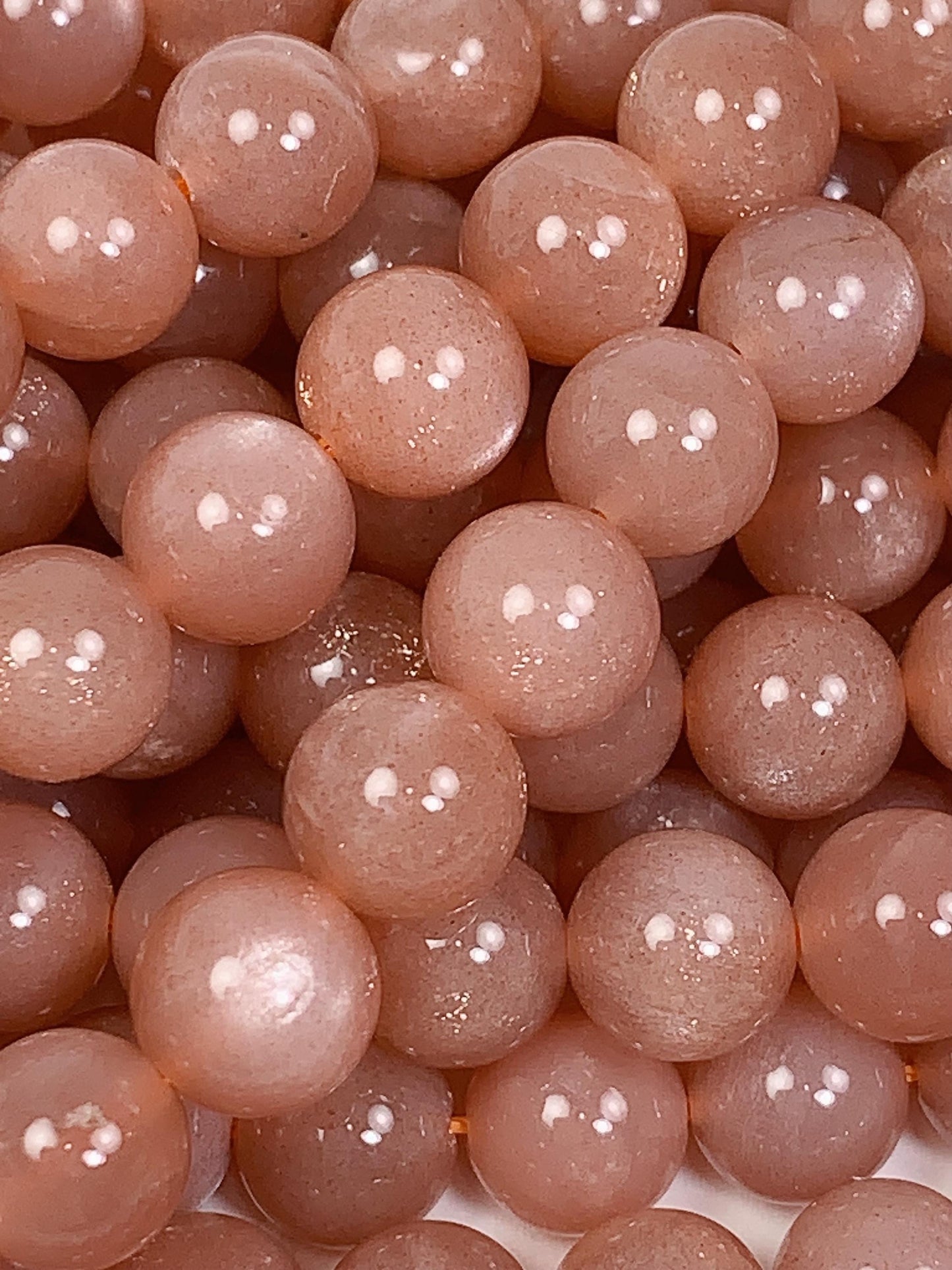 AAA Golden Peach Sunstone Beads: 15.5" Smooth Round Strand