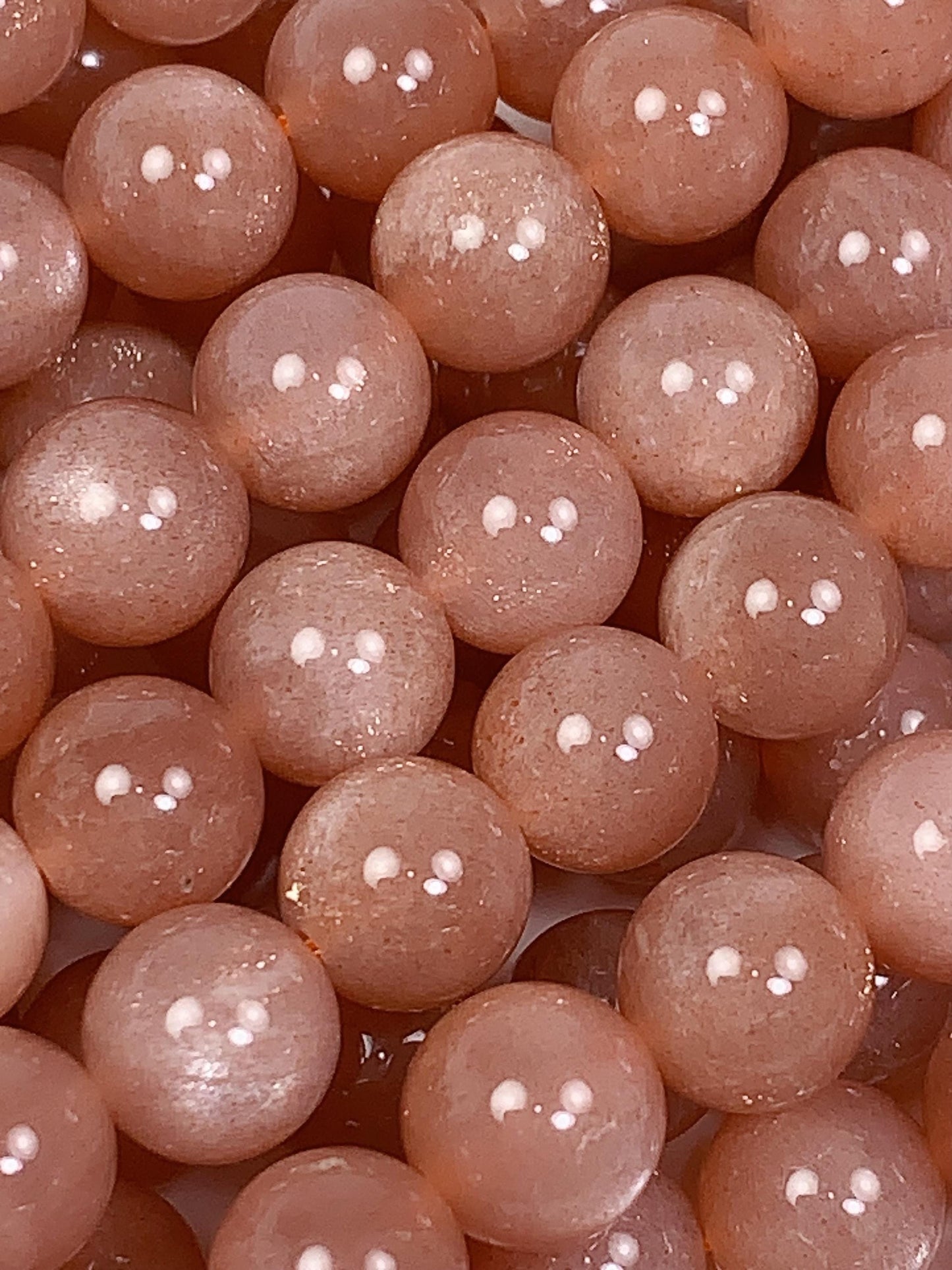 AAA Golden Peach Sunstone Beads: 15.5" Smooth Round Strand
