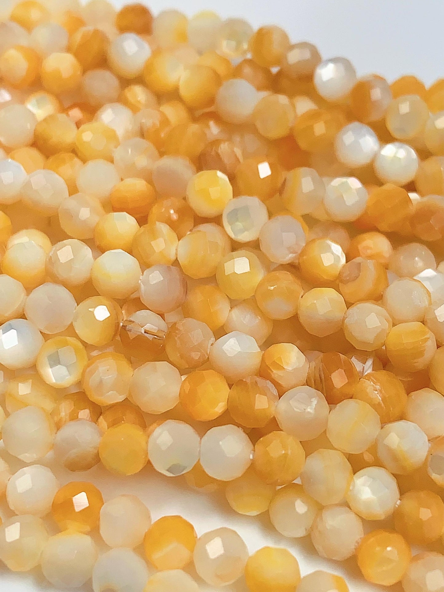 AAA Golden Mother of Pearl Faceted Round Beads: 15.5" Strand Yellow Gold