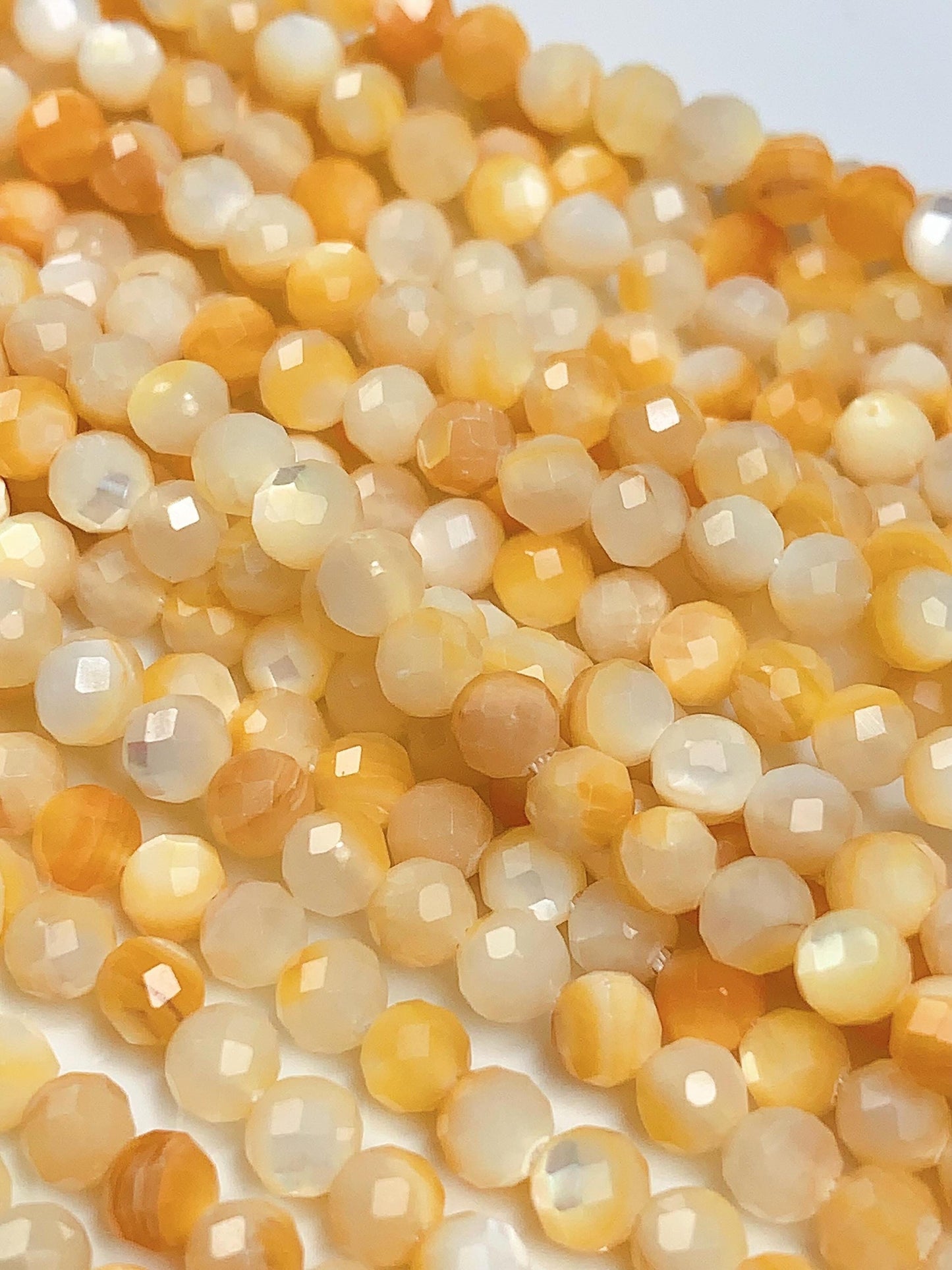 AAA Golden Mother of Pearl Faceted Round Beads: 15.5" Strand Yellow Gold