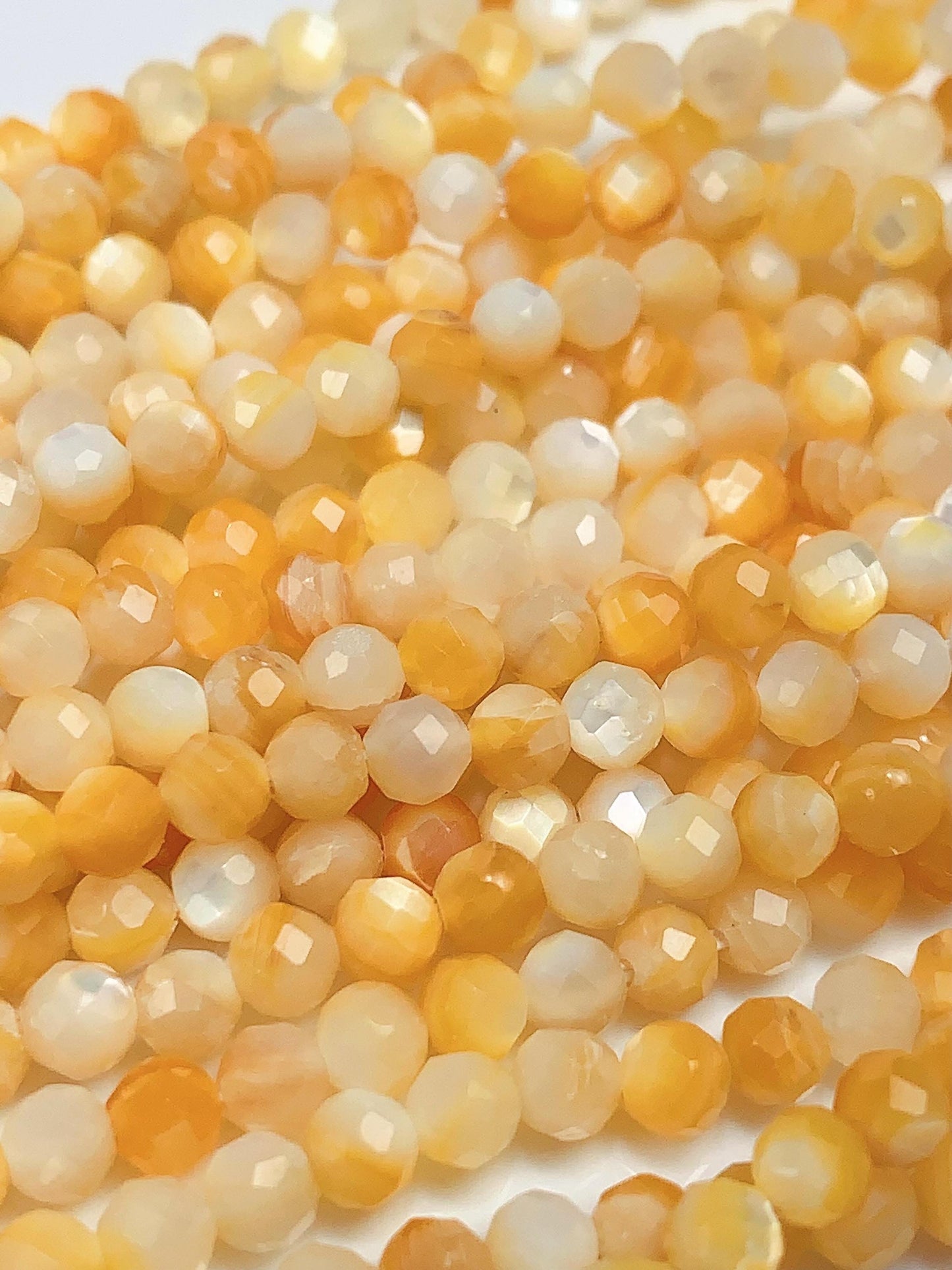 AAA Golden Mother of Pearl Faceted Round Beads: 15.5" Strand Yellow Gold