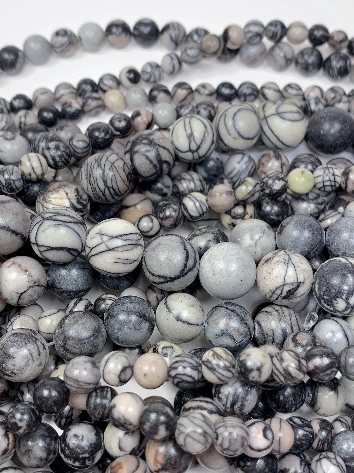 Natural Black Spider Web Jasper Beads: Smooth Round Gemstone Strand
