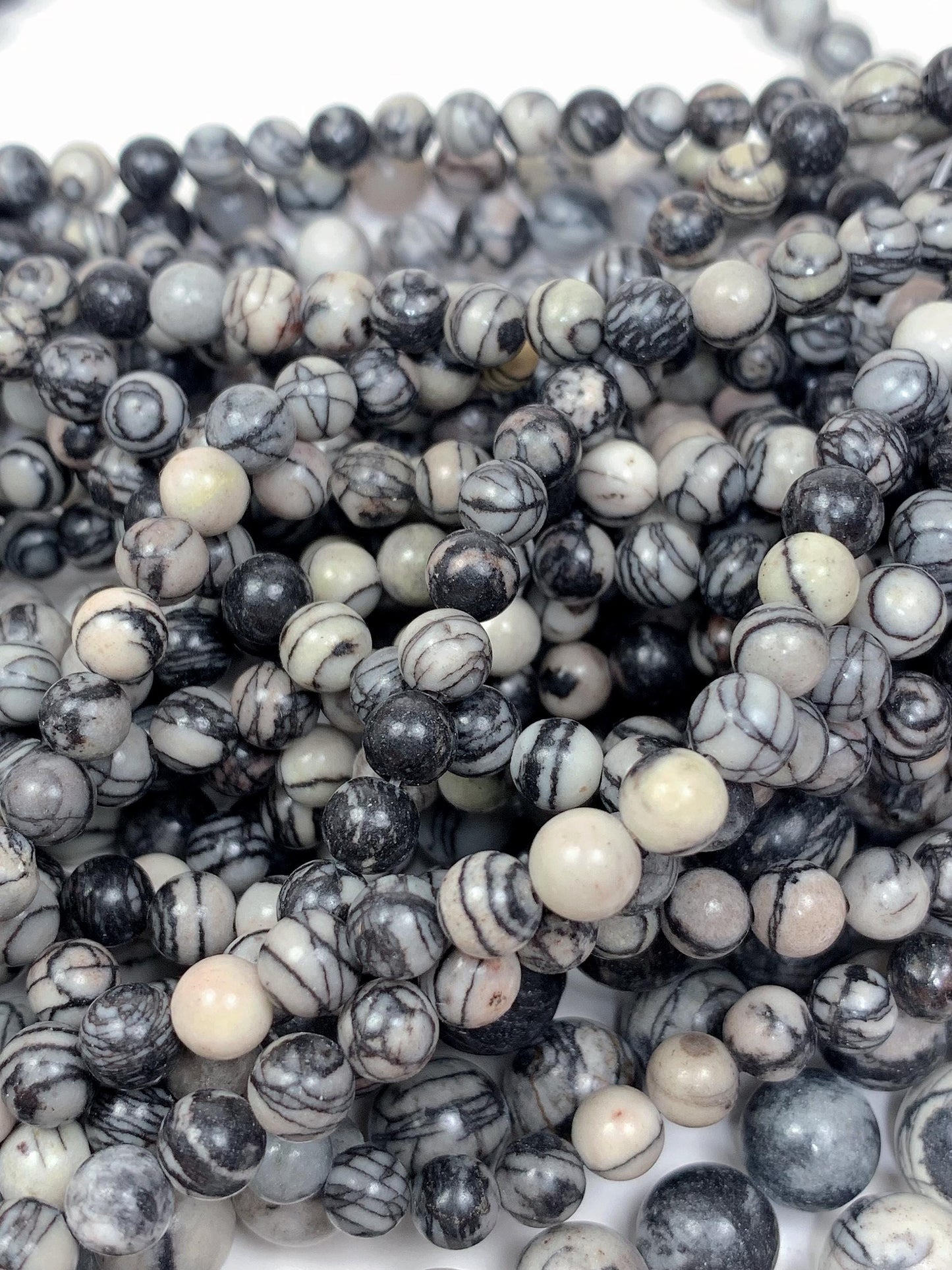 Natural Black Spider Web Jasper Beads: Smooth Round Gemstone Strand