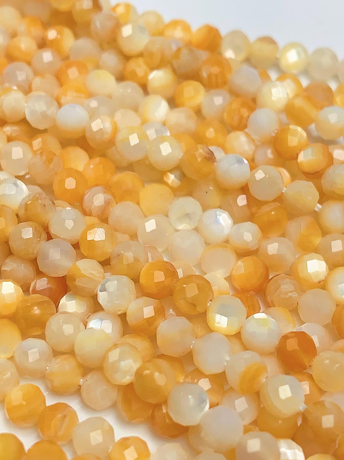 AAA Golden Mother of Pearl Faceted Round Beads: 15.5" Strand Yellow Gold