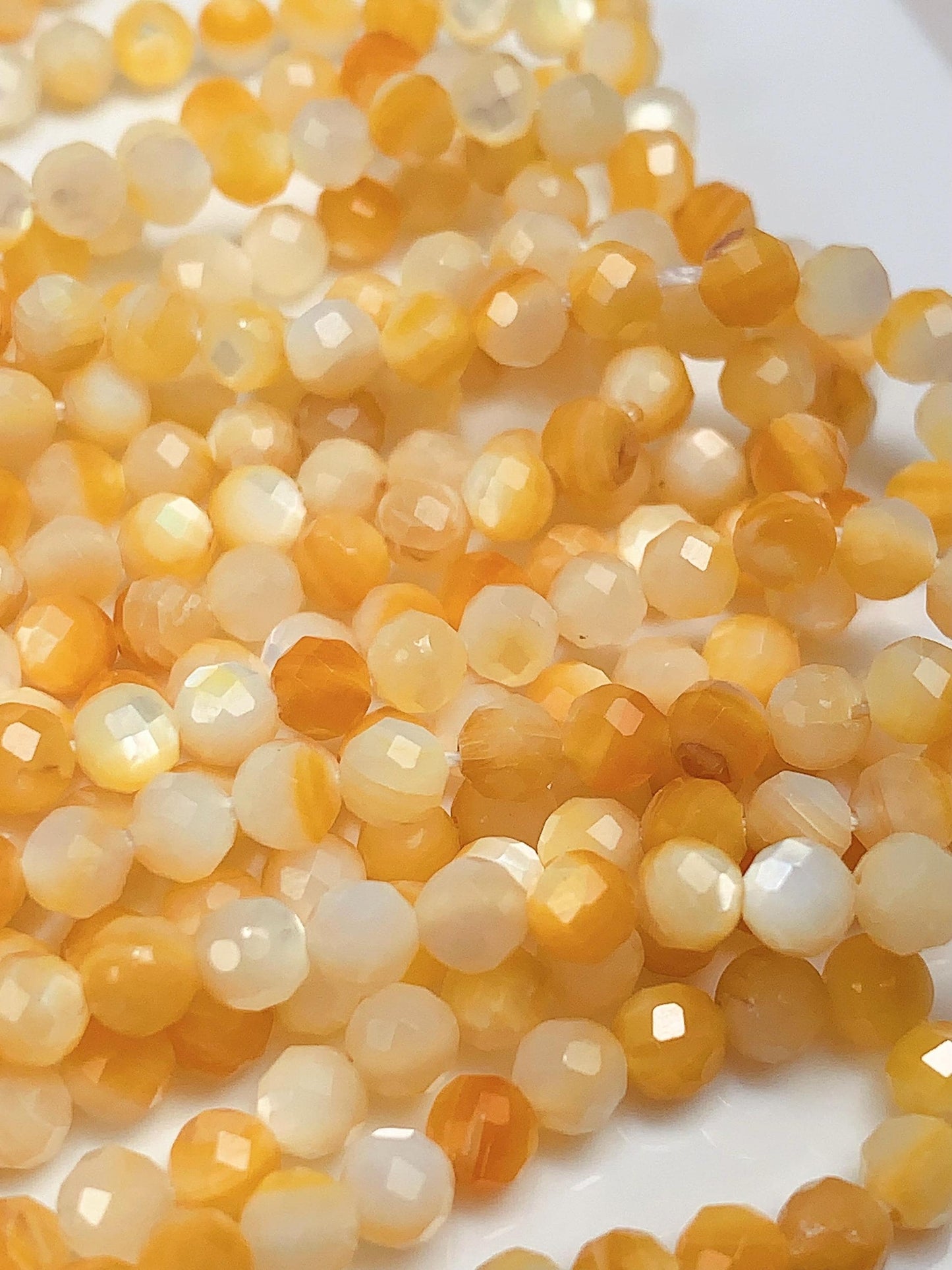AAA Golden Mother of Pearl Faceted Round Beads: 15.5" Strand Yellow Gold