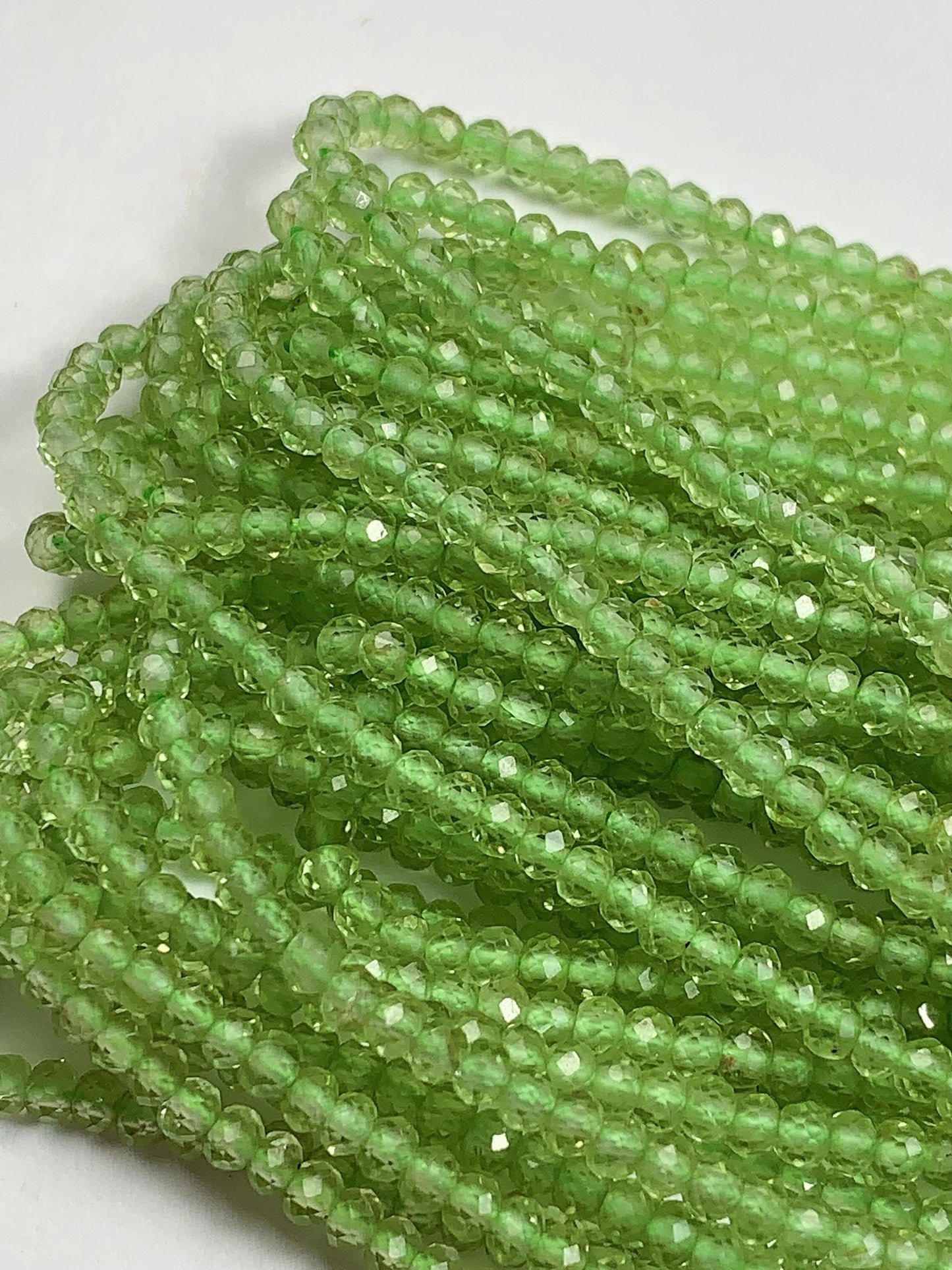 AAA Green Peridot Faceted Rondelle Beads: 2x3mm, 15.5" Strand