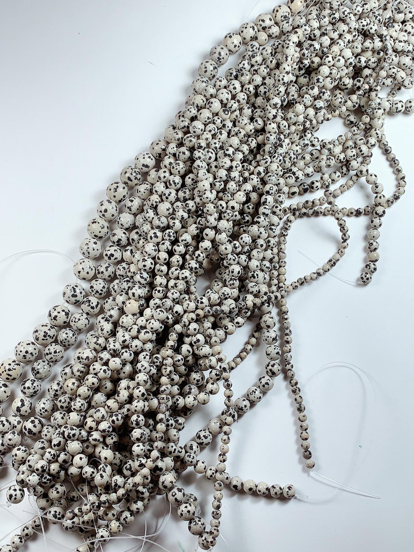Natural Dalmatian Jasper Beads: Smooth Round Gemstone Strand