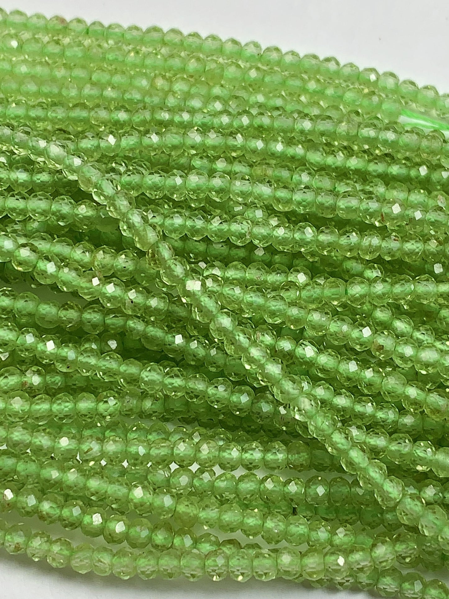 AAA Green Peridot Faceted Rondelle Beads: 2x3mm, 15.5" Strand