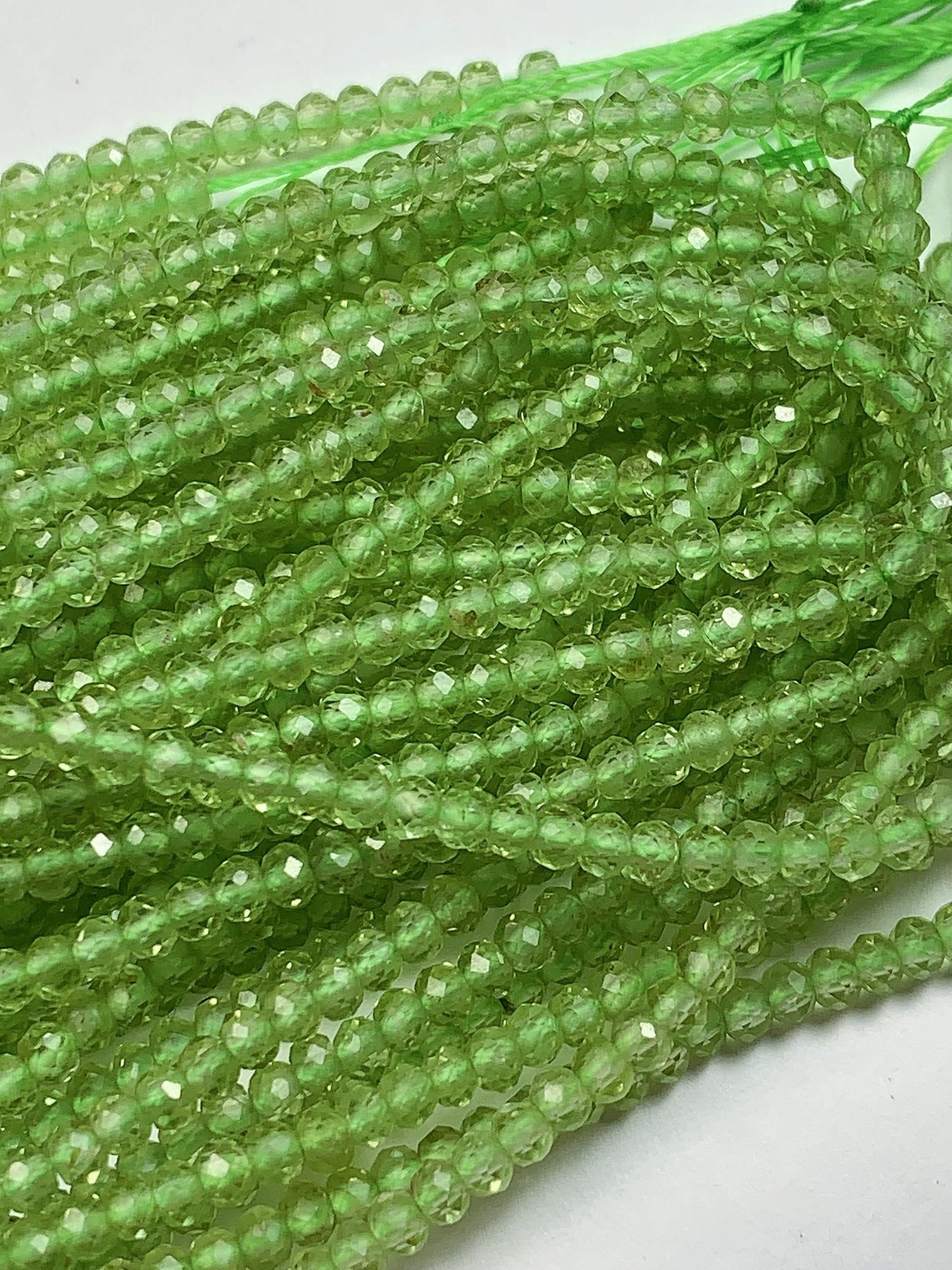 AAA Green Peridot Faceted Rondelle Beads: 2x3mm, 15.5" Strand