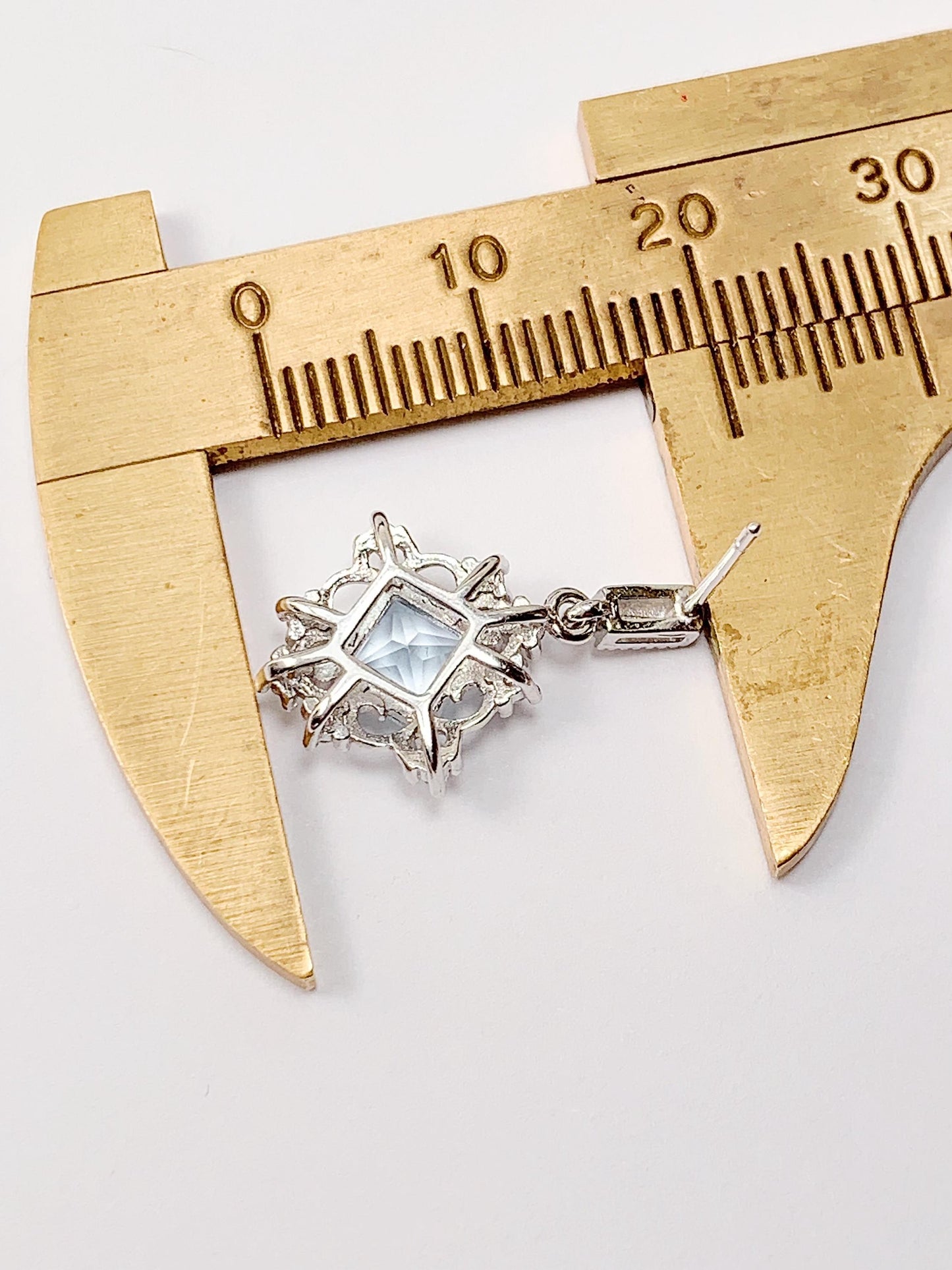 Blue Topaz Sterling Silver Earrings: 18k White Gold Plated Studs