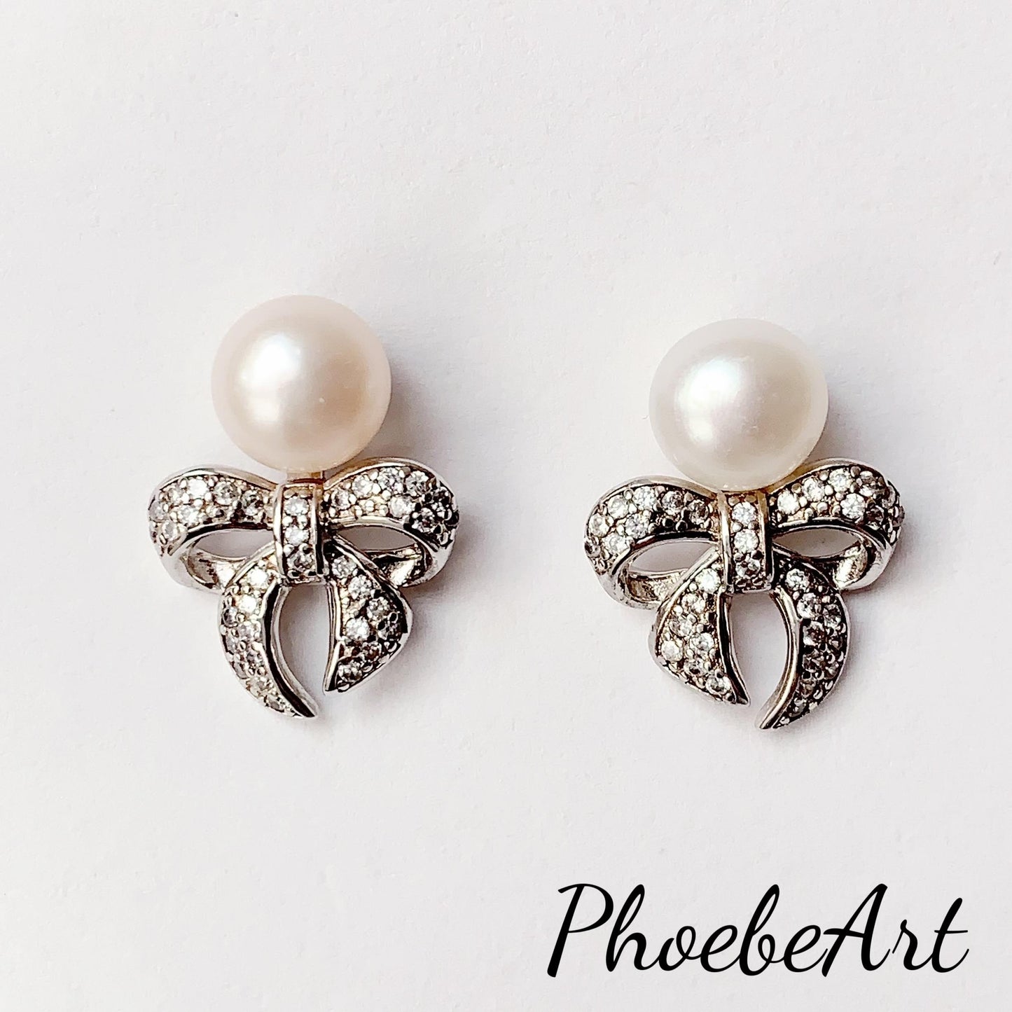 Freshwater Pearl Earrings: 18K White Gold Plated Sterling Silver Bow Studs