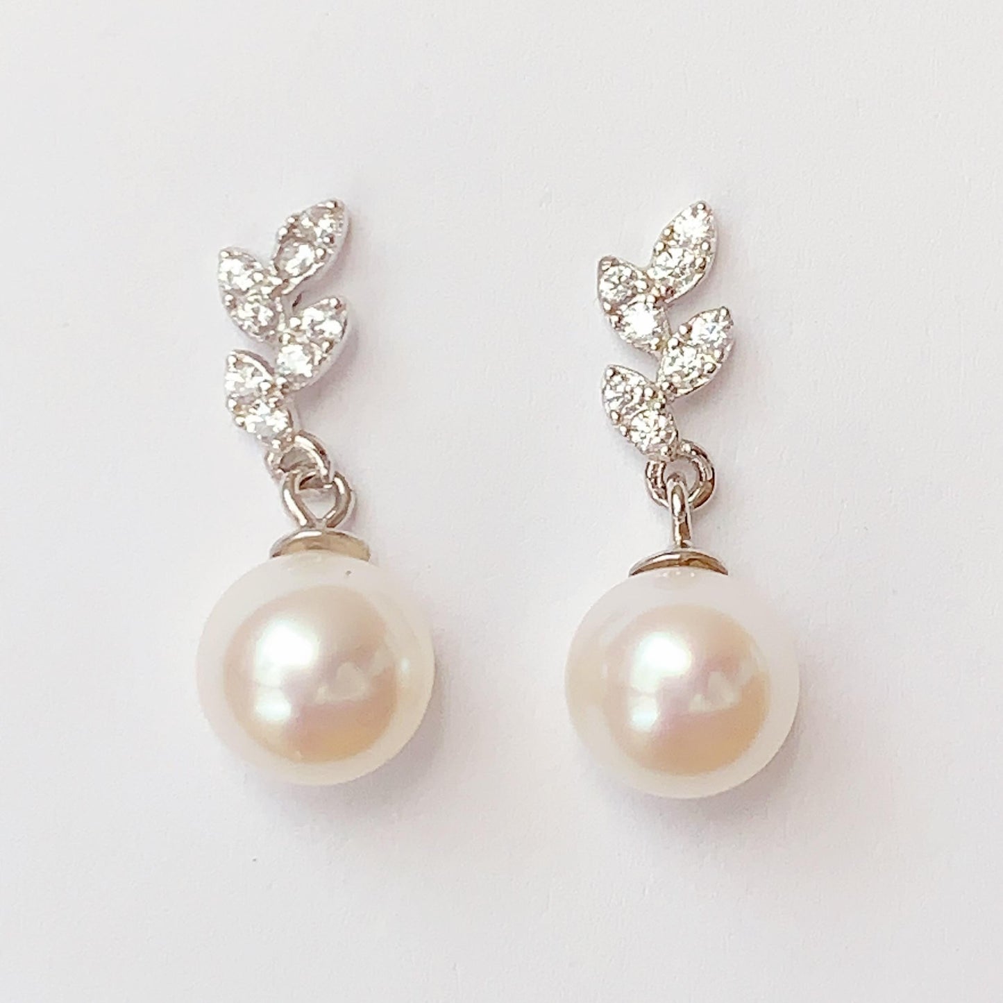 Freshwater Pearl Earrings: 18k White Gold Plated Sterling Silver Leaf Studs