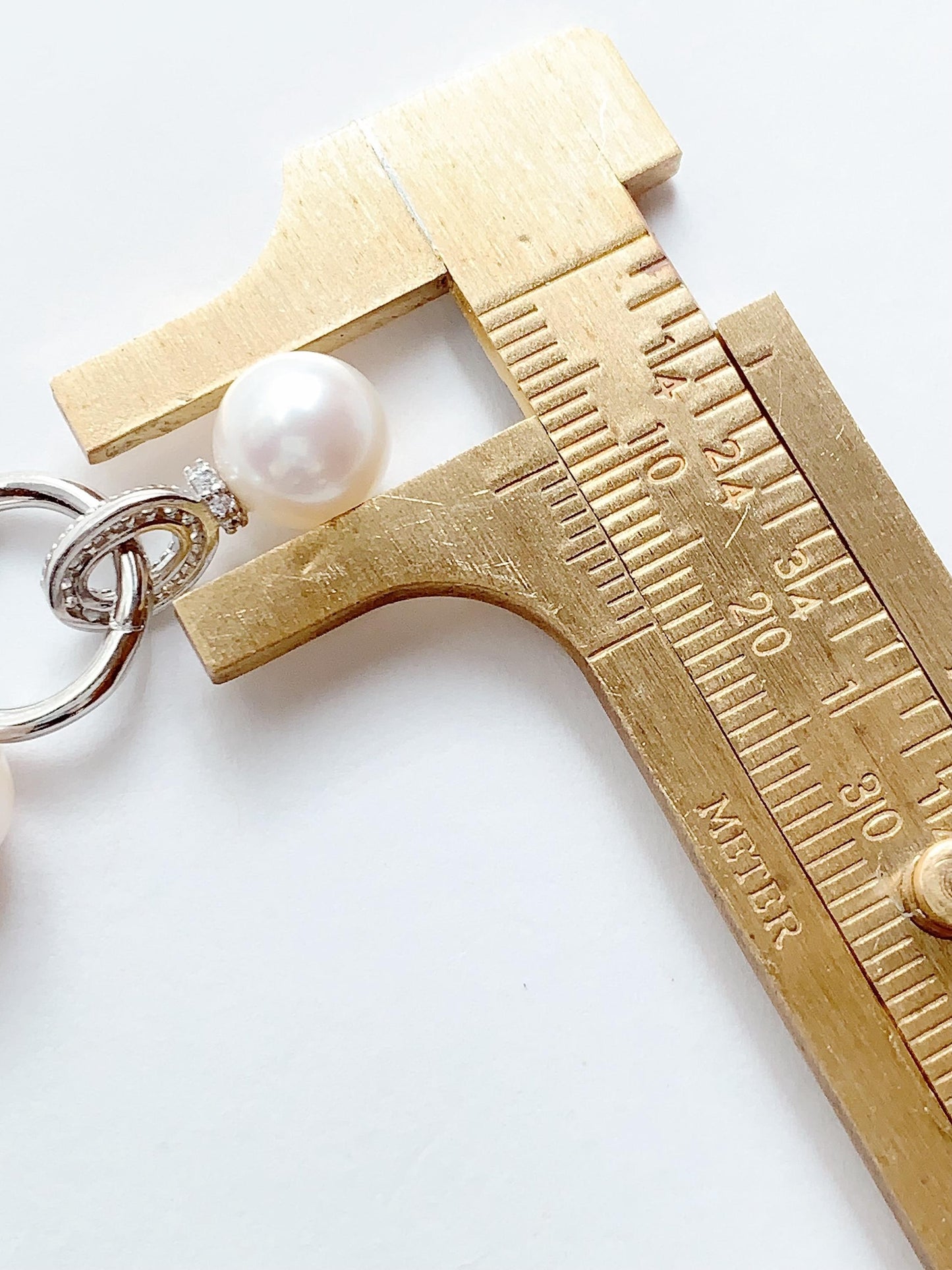8.5mm Freshwater Pearl Earrings: Sterling Silver, Zircon Accent