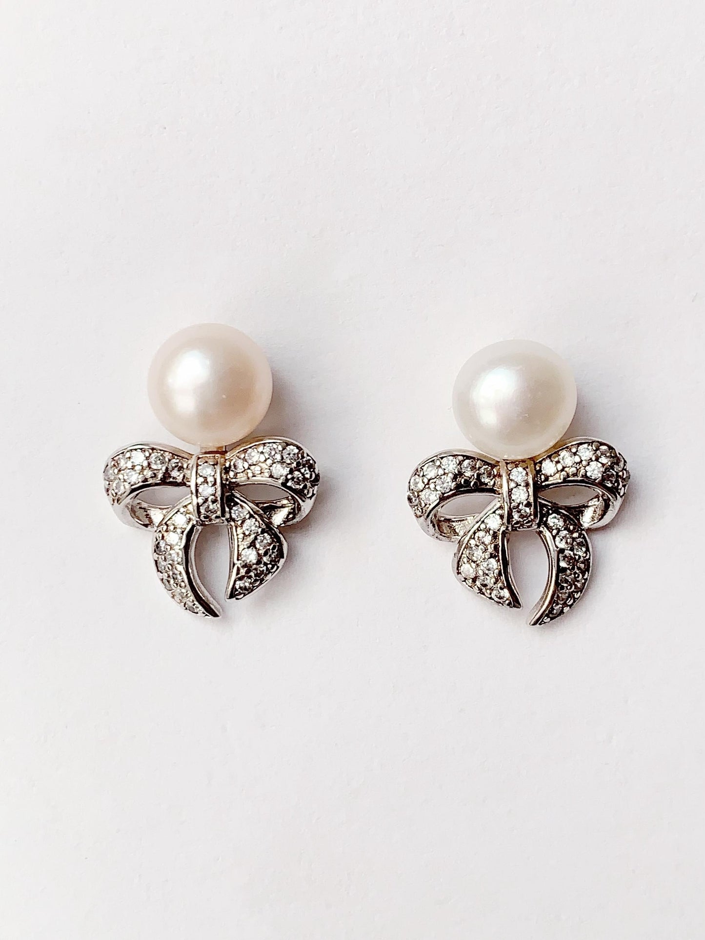 Freshwater Pearl Earrings: 18K White Gold Plated Sterling Silver Bow Studs