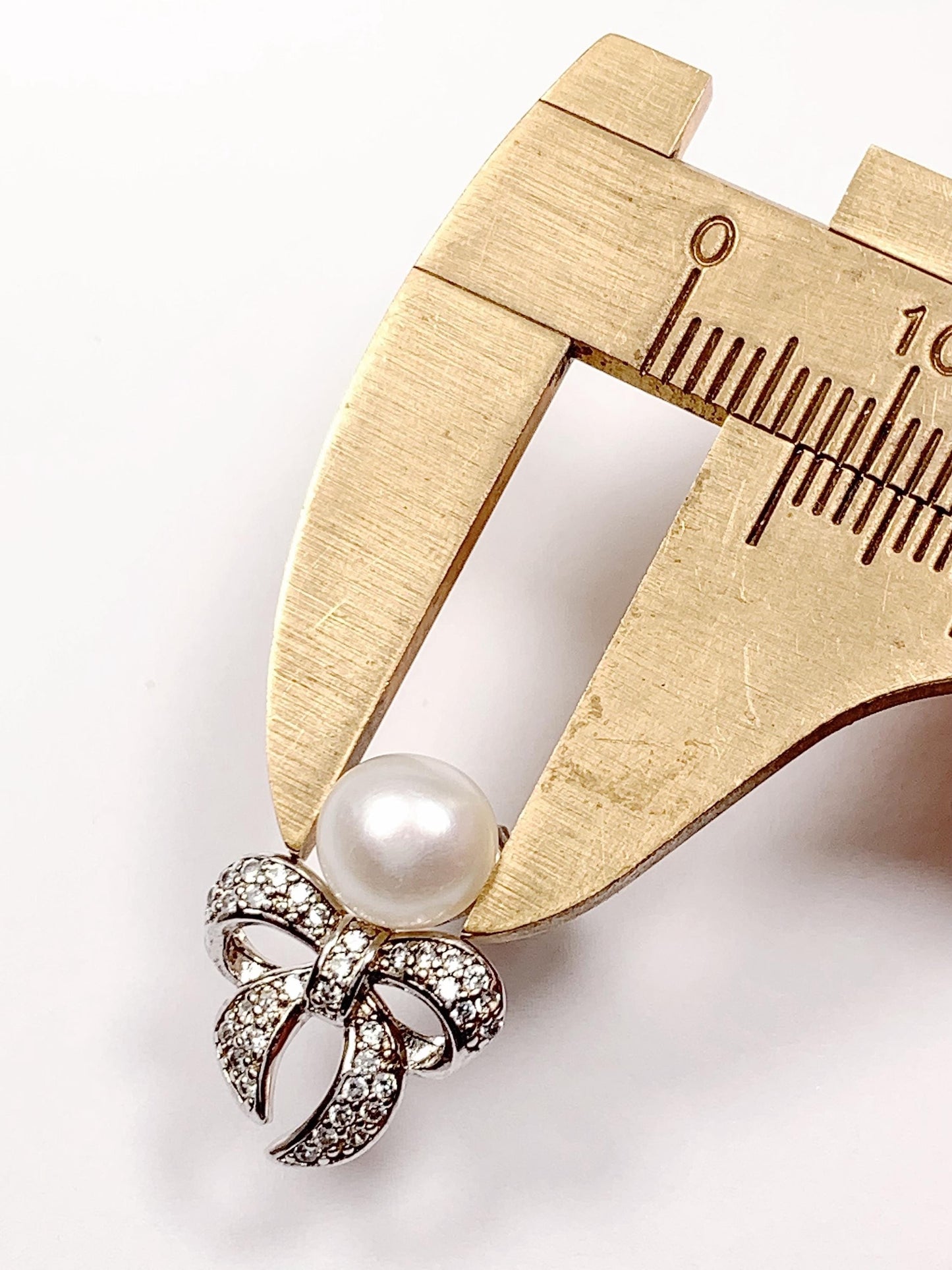 Freshwater Pearl Earrings: 18K White Gold Plated Sterling Silver Bow Studs