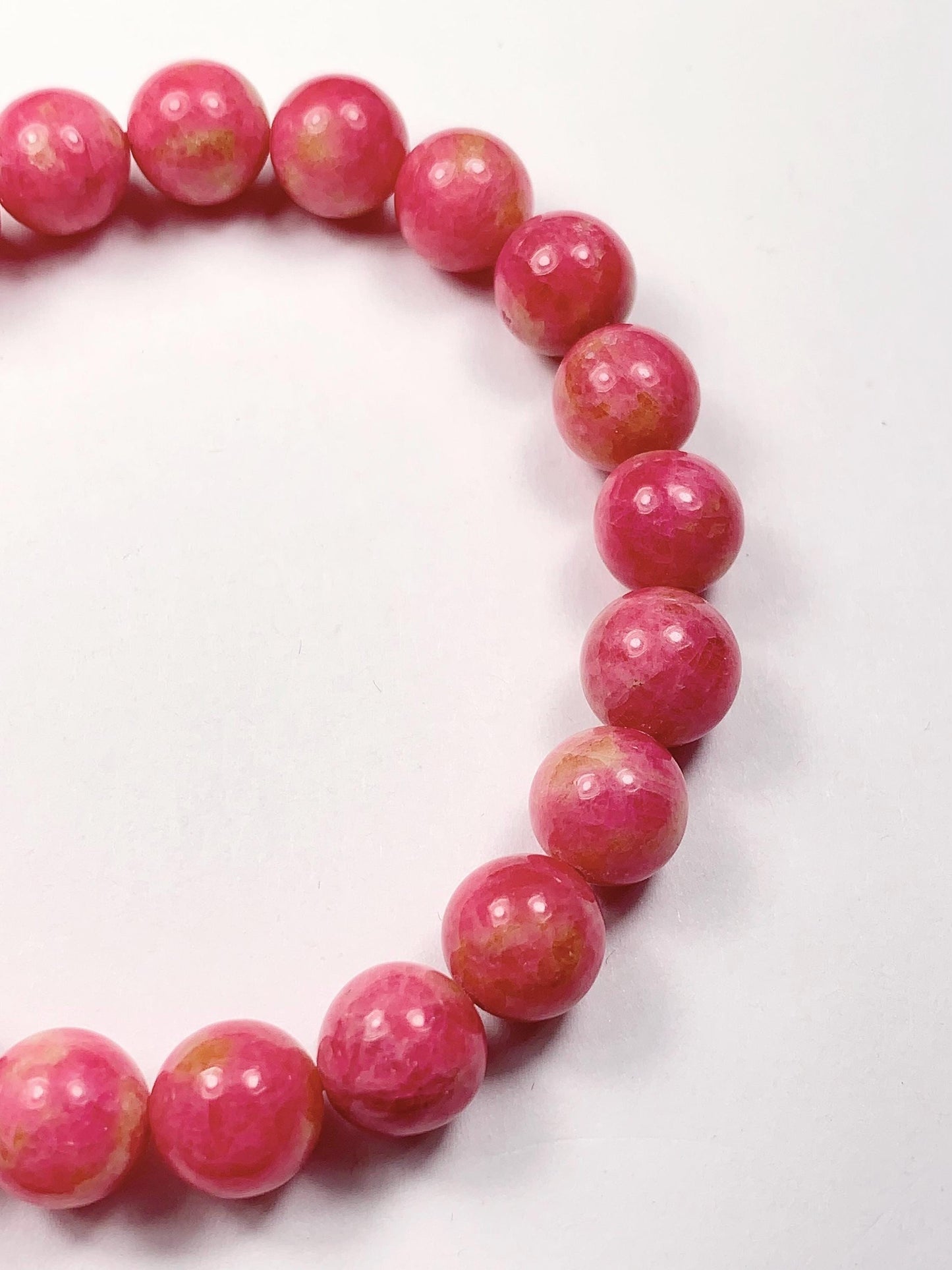 Natural Pink Rhodonite Bracelet: Golden Smooth Round Gemstone (9mm)