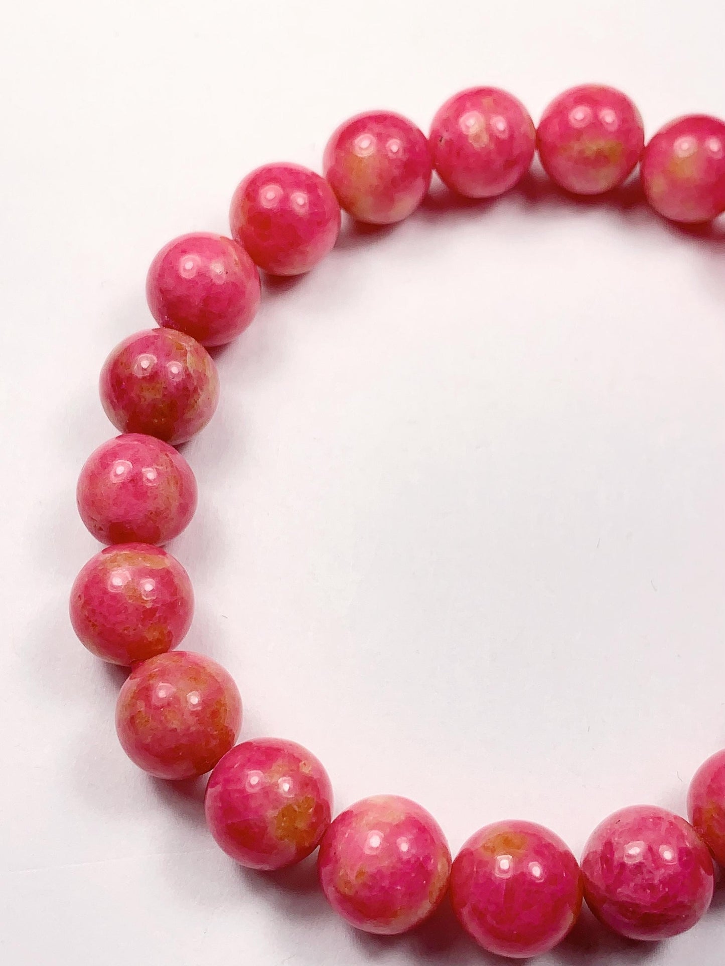 Natural Pink Rhodonite Bracelet: Golden Smooth Round Gemstone (9mm)