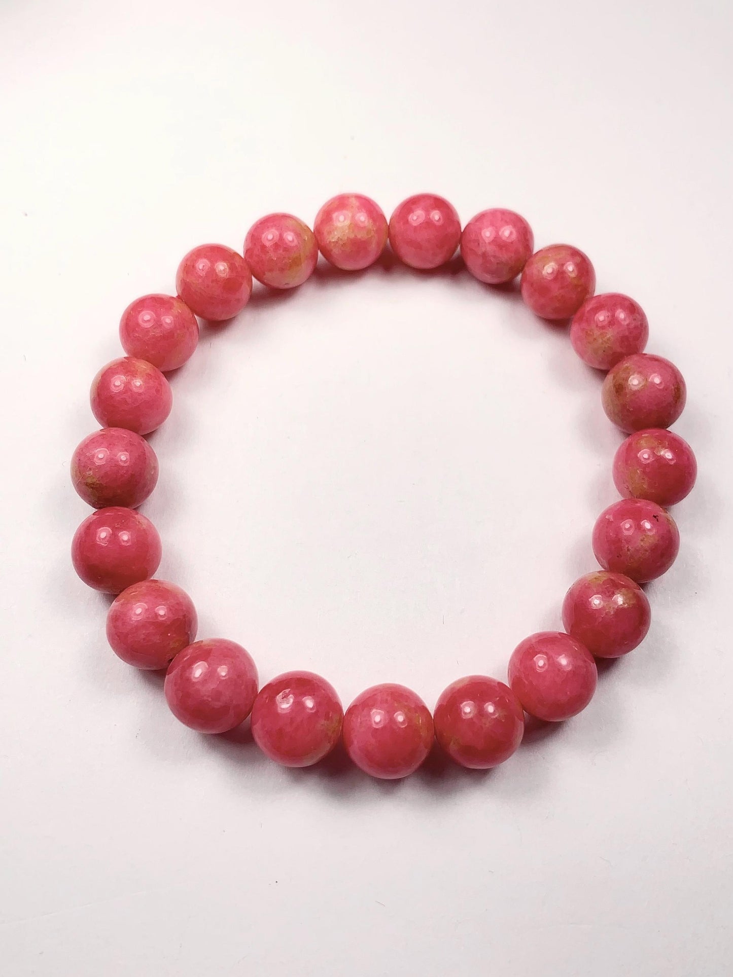Natural Pink Rhodonite Bracelet: Golden Smooth Round Gemstone (9mm)