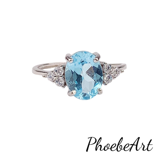 Oval Swiss Blue Topaz Ring: 18K Gold Plated Sterling Silver