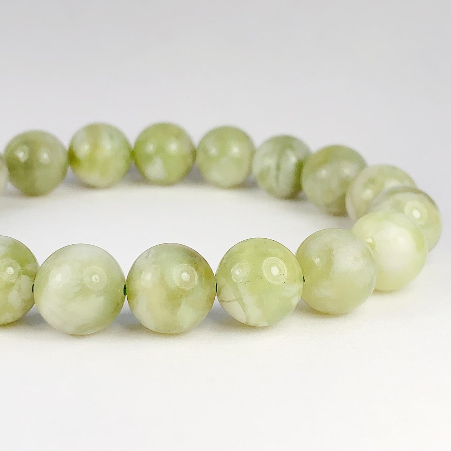 Genuine Natural Green Grape Sepentine Jade Smooth Round Stretch Bracelet   10mm Birthstone