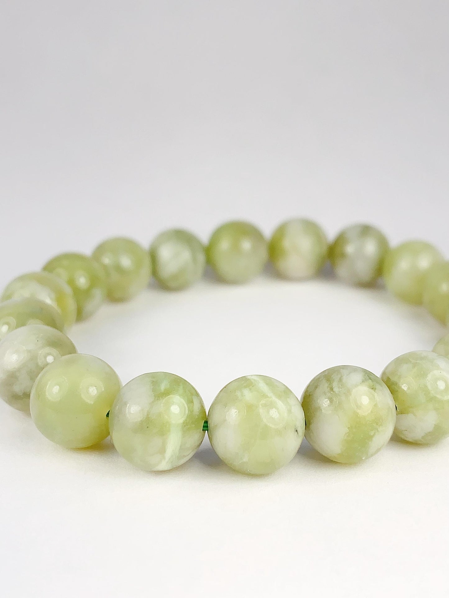 Genuine Natural Green Grape Sepentine Jade Smooth Round Stretch Bracelet   10mm Birthstone