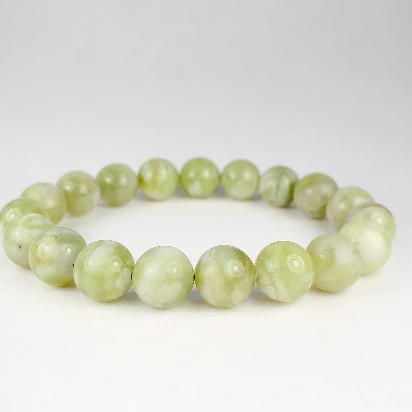 Genuine Natural Green Grape Sepentine Jade Smooth Round Stretch Bracelet   10mm Birthstone