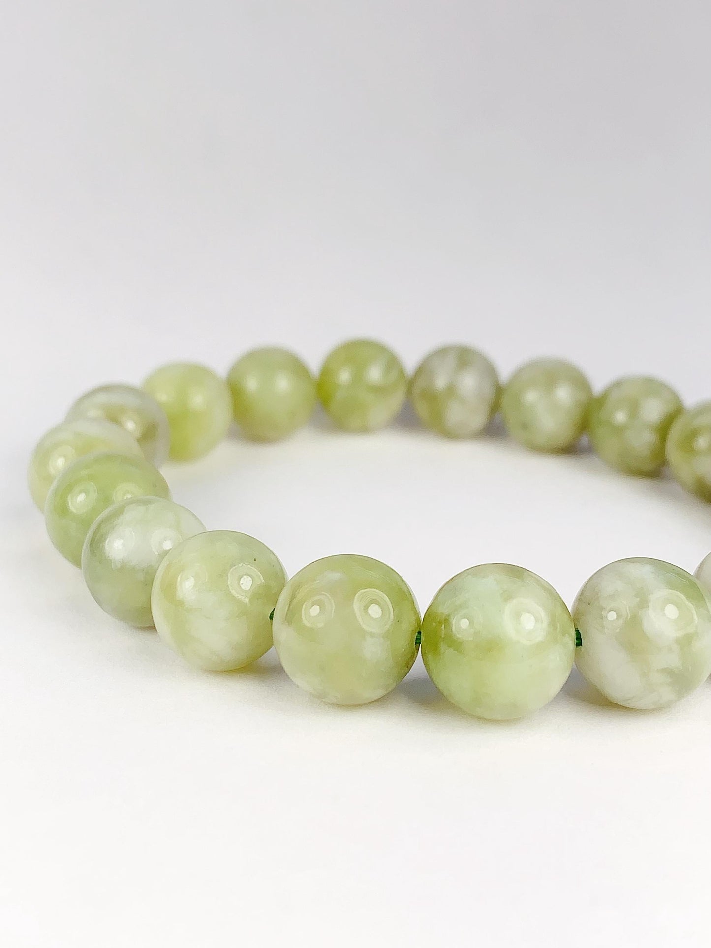 Genuine Natural Green Grape Sepentine Jade Smooth Round Stretch Bracelet   10mm Birthstone