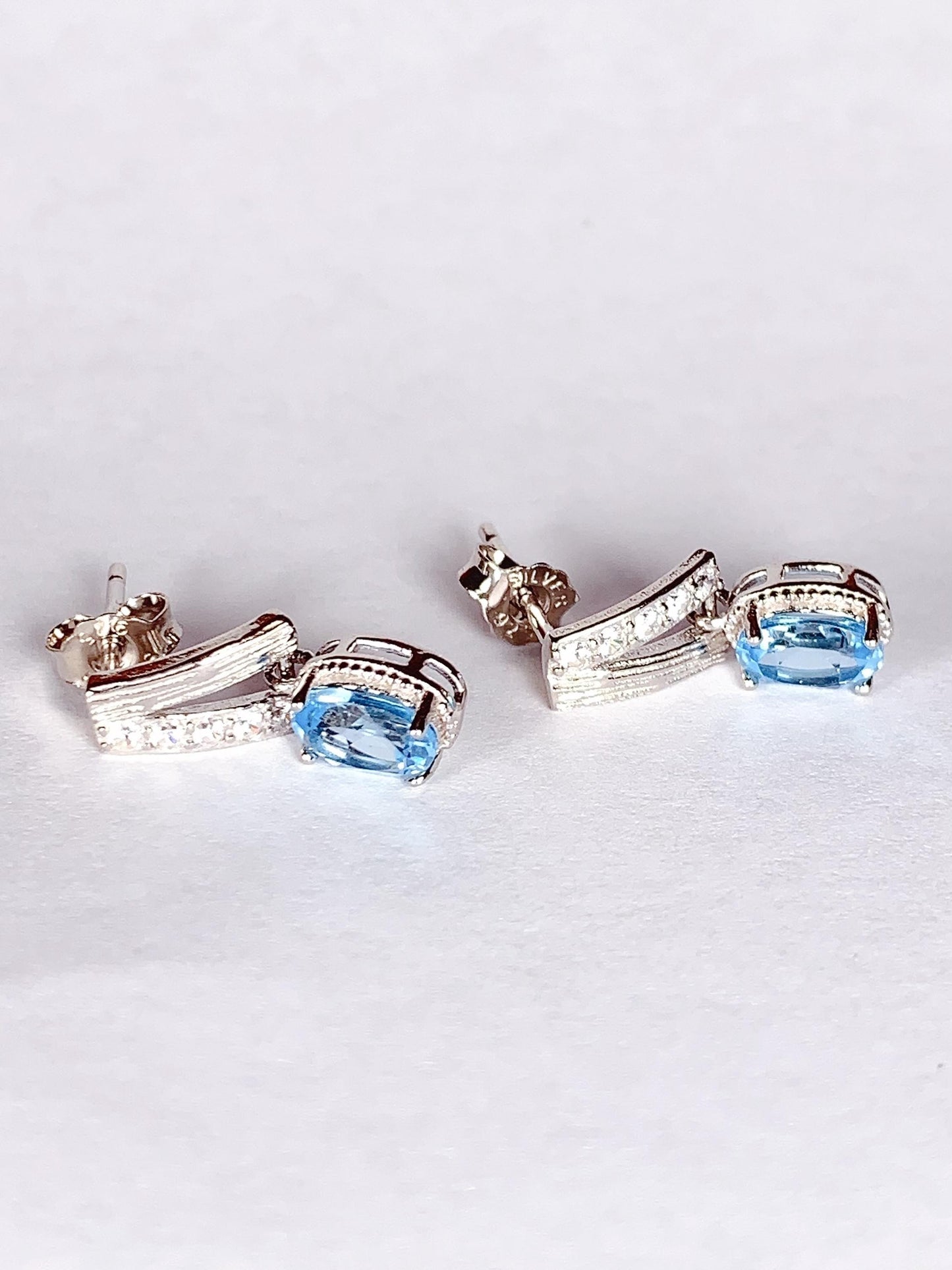 Skype Blue Topaz Earrings: Oval Cut, 18k Gold Plated Sterling Silver