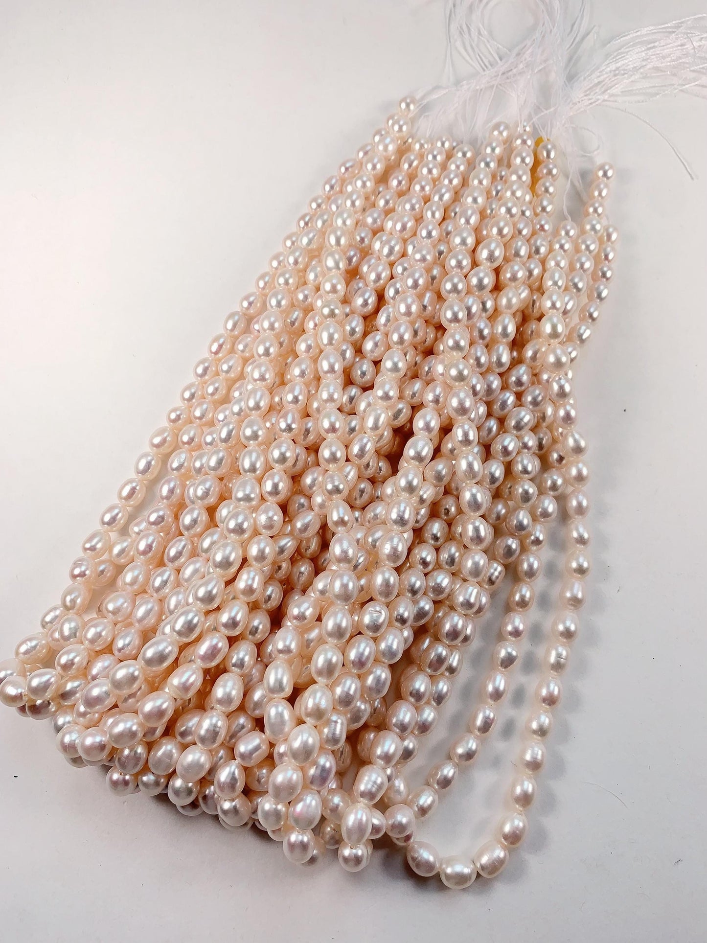 AAA White Oval Pearl Beads: 7mm Natural Gemstone Strand