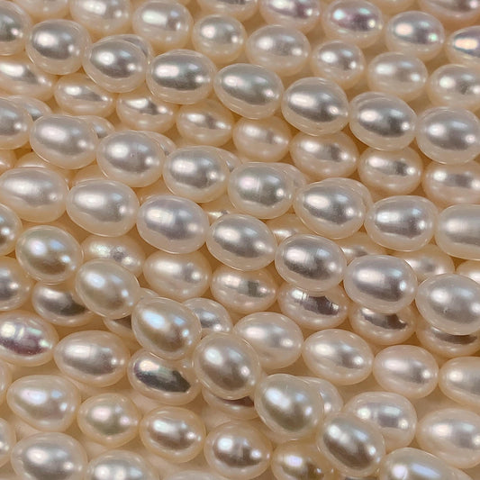AAA White Oval Pearl Beads: Natural Gemstone Strand (6-6.5mm)