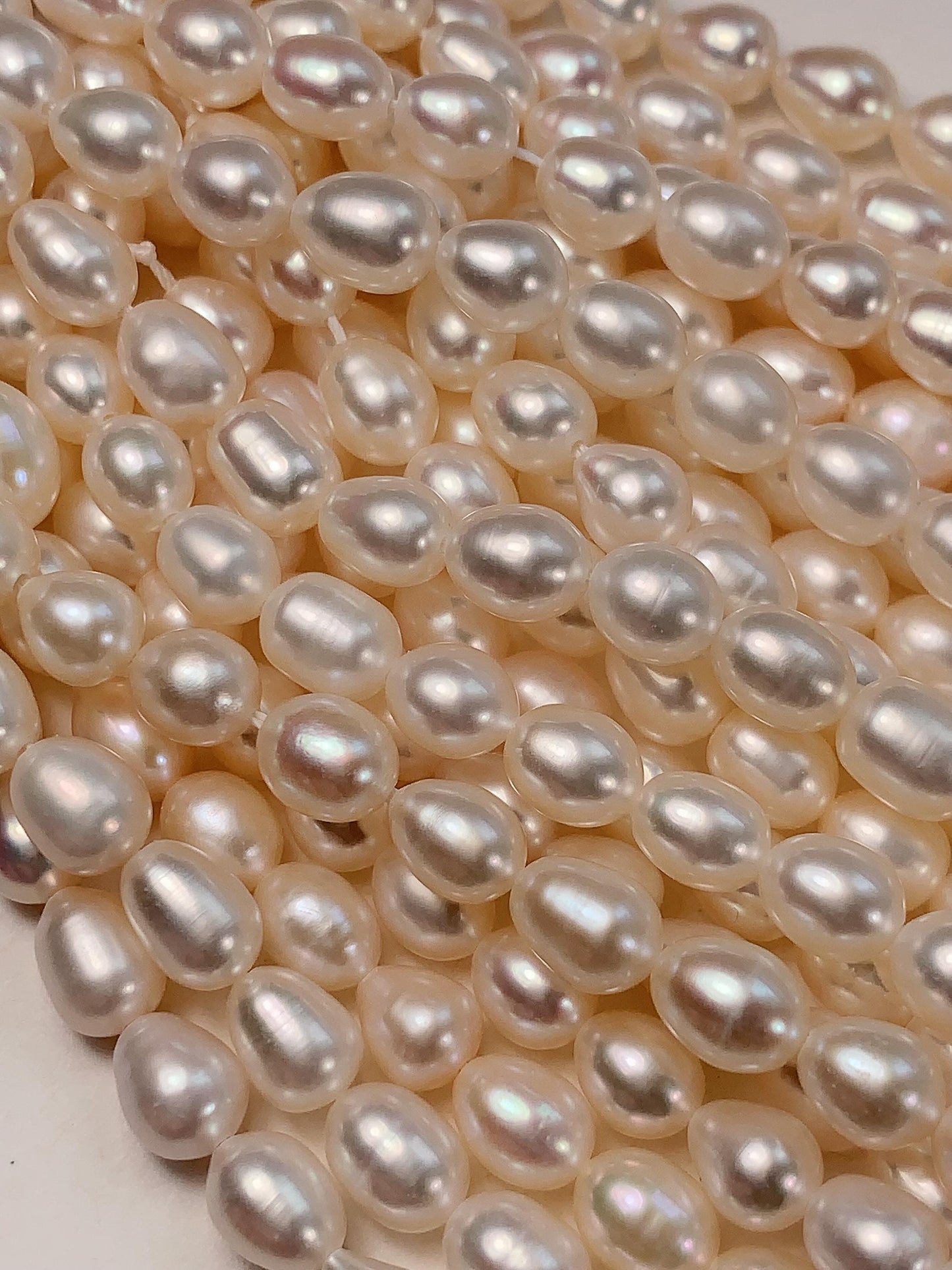 AAA White Oval Pearl Beads: Natural Gemstone Strand (6-6.5mm)