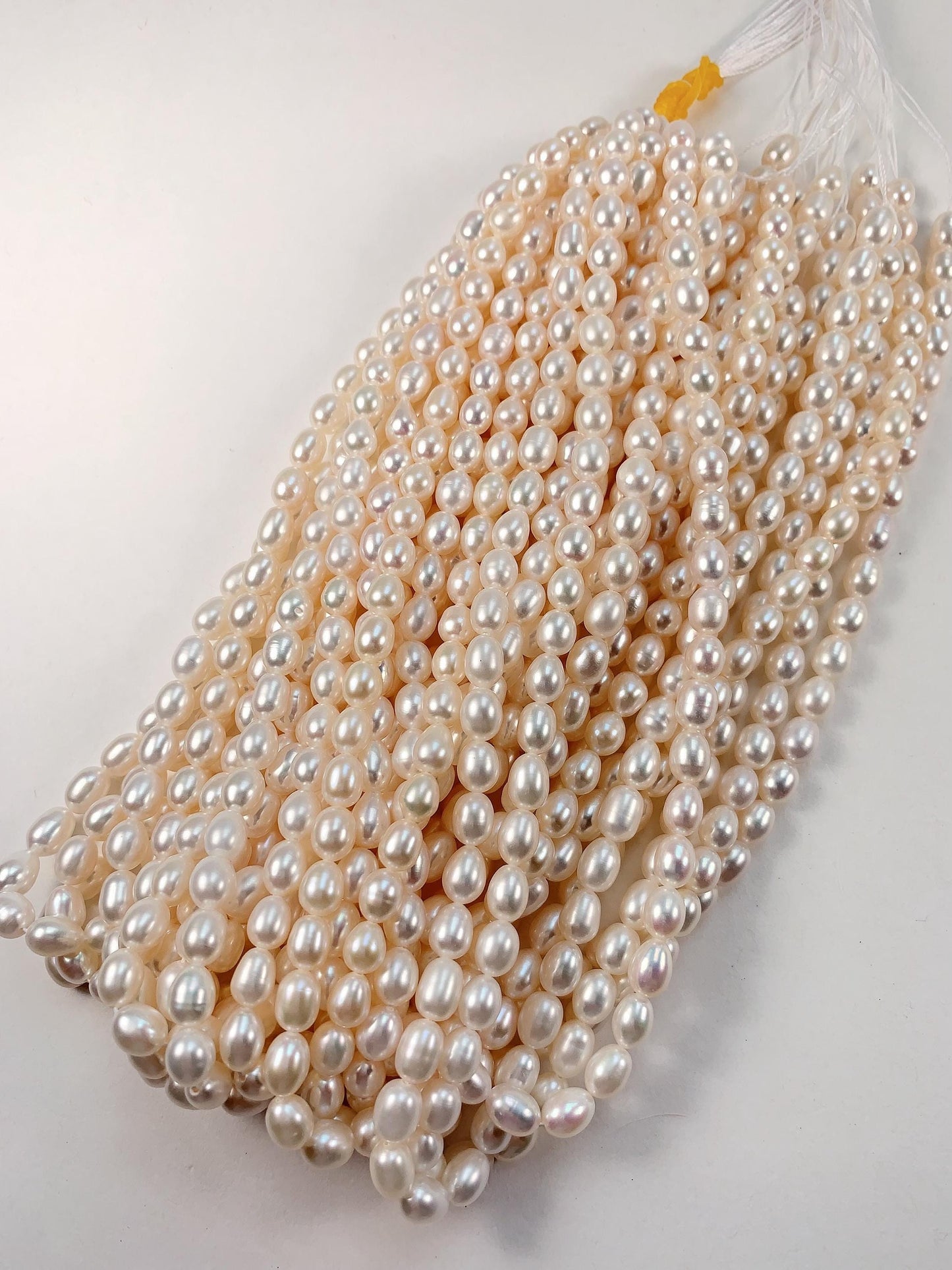 AAA White Oval Pearl Beads: Natural Gemstone Strand (6-6.5mm)