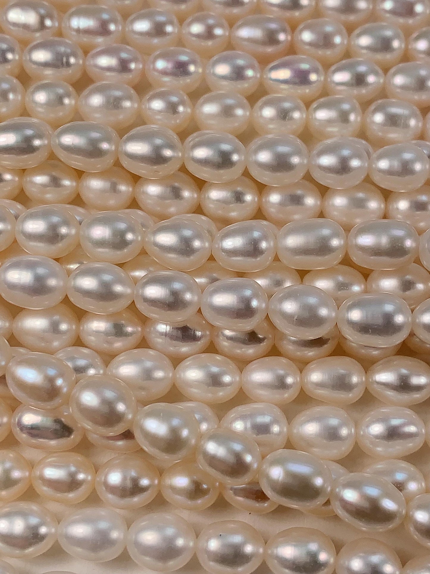 AAA White Oval Pearl Beads: Natural Gemstone Strand (6-6.5mm)