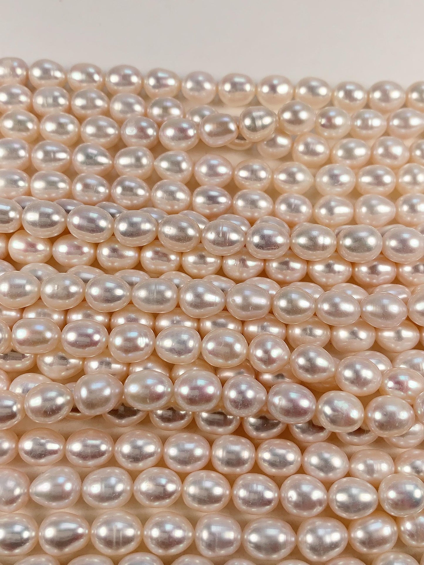 AAA White Oval Pearl Beads: 7mm Natural Gemstone Strand