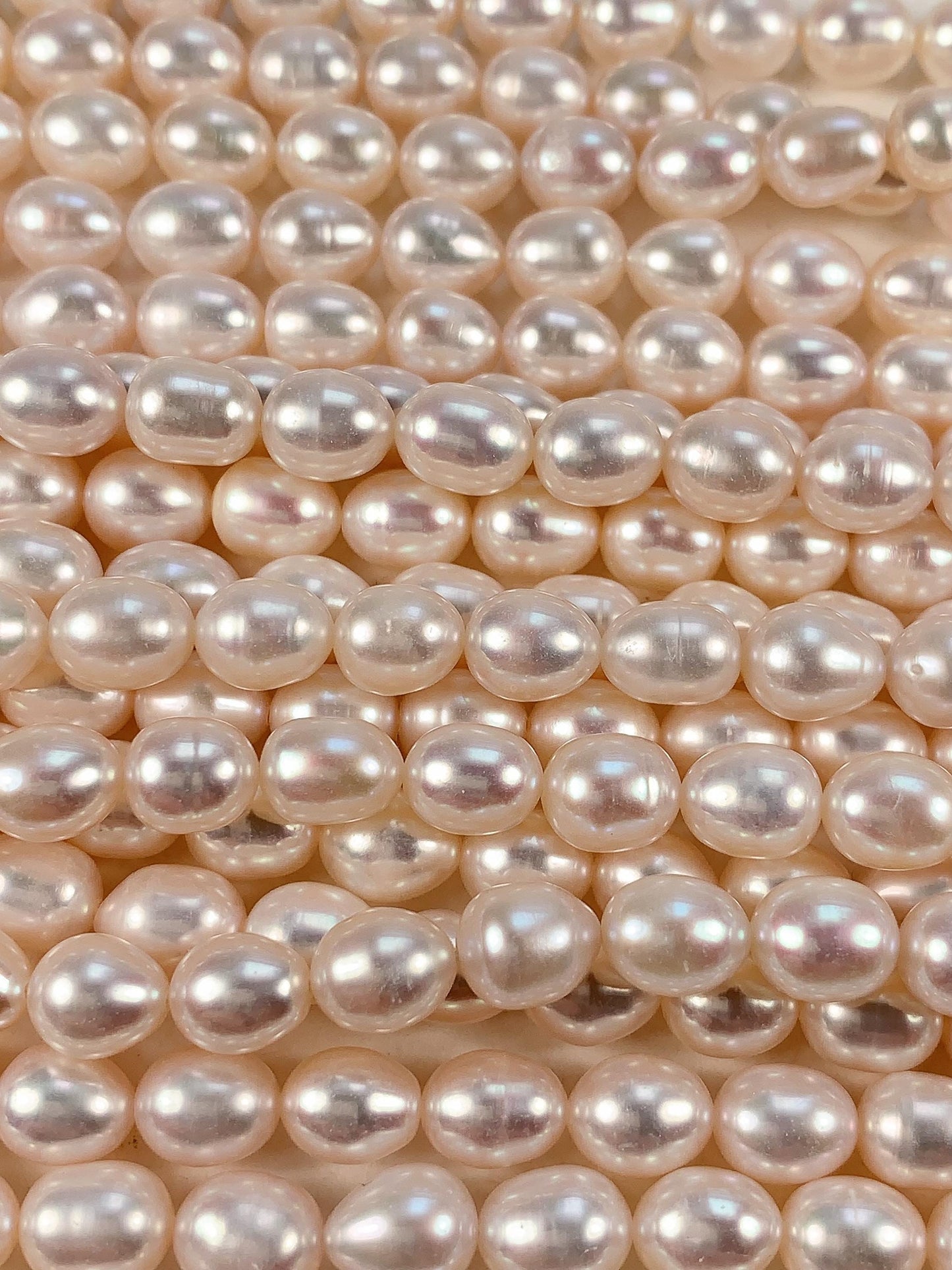 AAA White Oval Pearl Beads: 7mm Natural Gemstone Strand