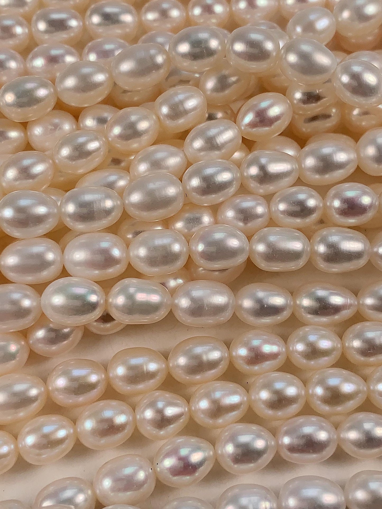 AAA White Oval Pearl Beads: Natural Gemstone Strand (6-6.5mm)