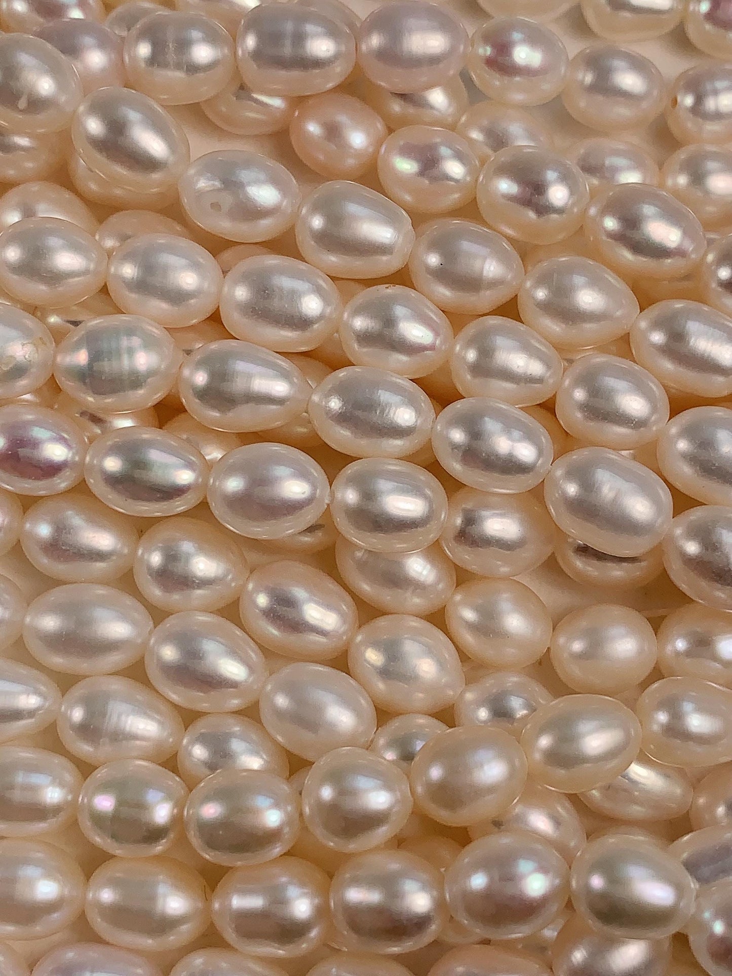 AAA White Oval Pearl Beads: Natural Gemstone Strand (6-6.5mm)