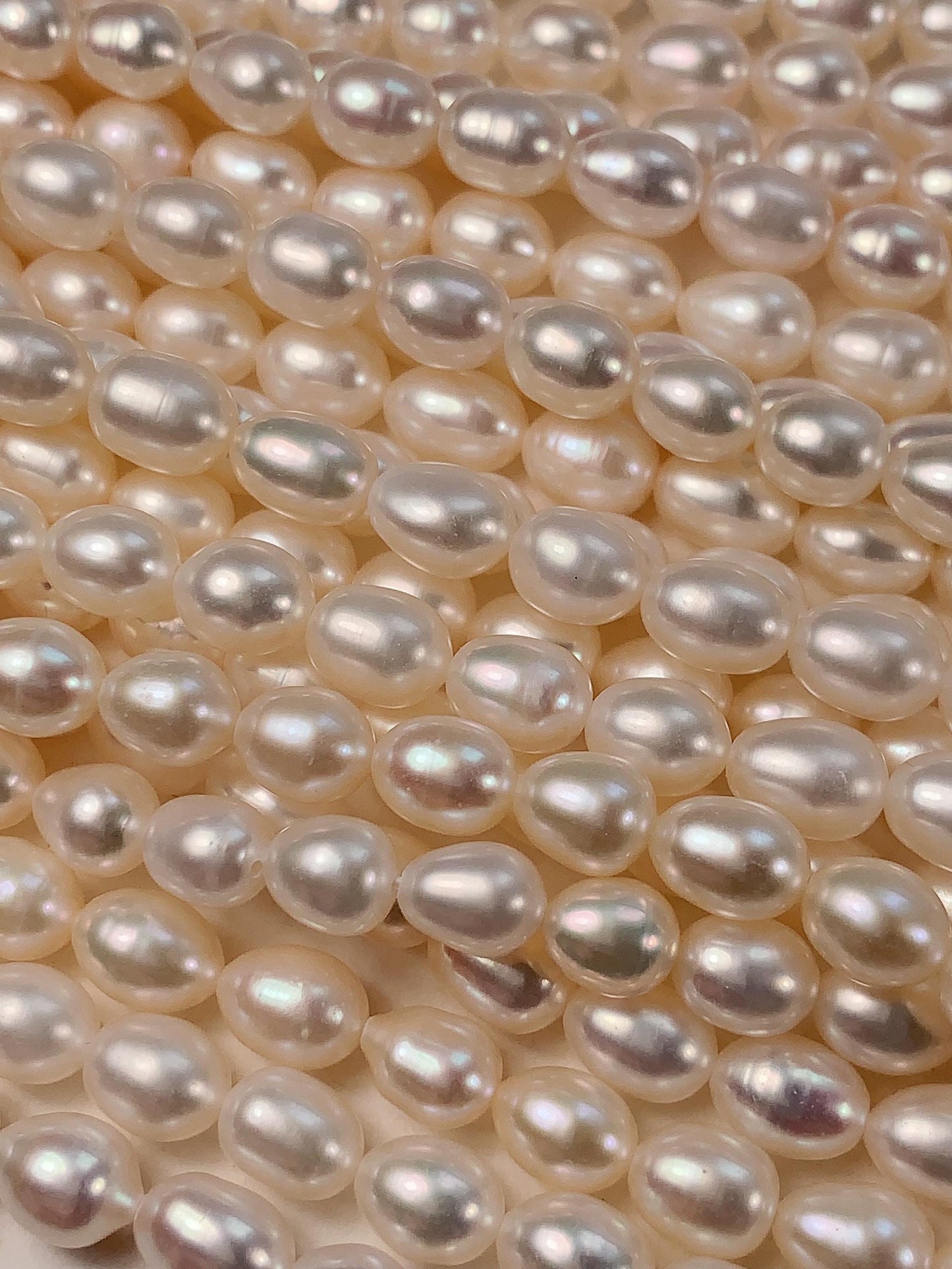 AAA White Oval Pearl Beads: Natural Gemstone Strand (6-6.5mm)