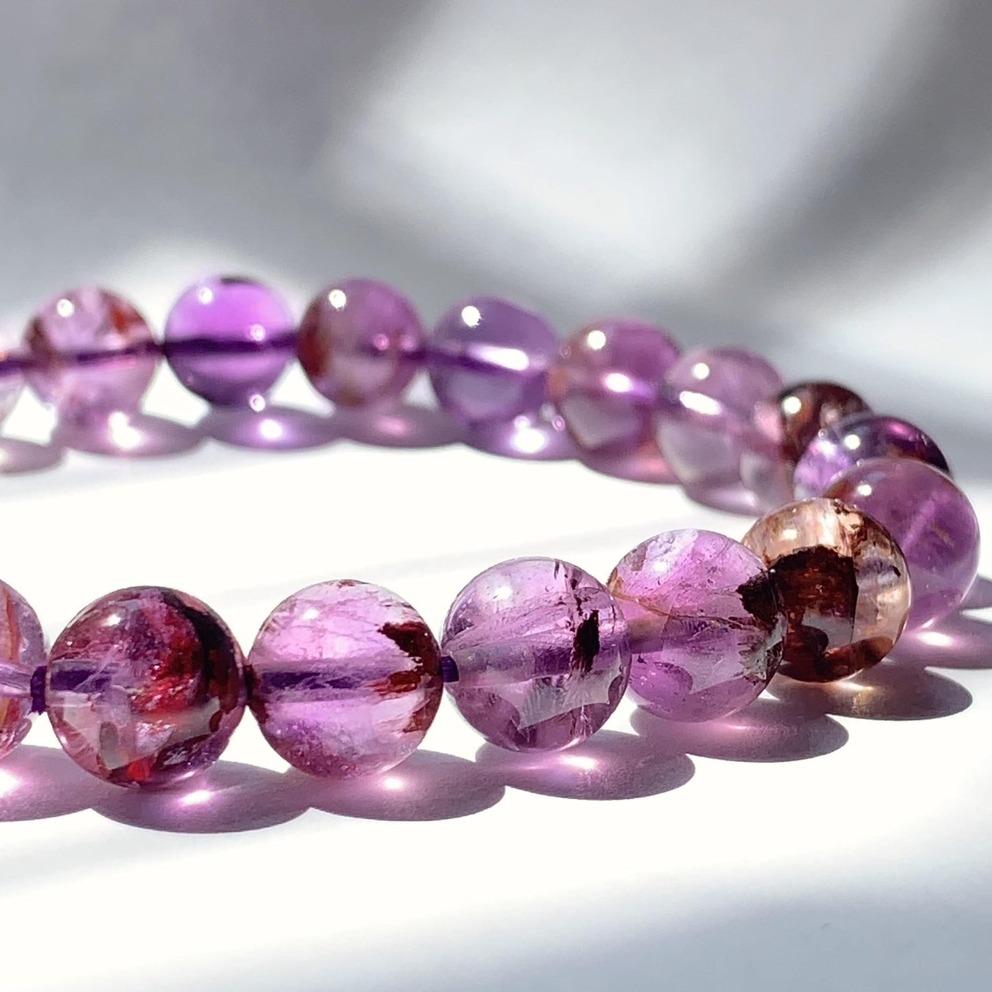 Super 7 Crystal Bracelet: Natural Amethyst Cacoxenite Quartz, Purple Brown Gemstone